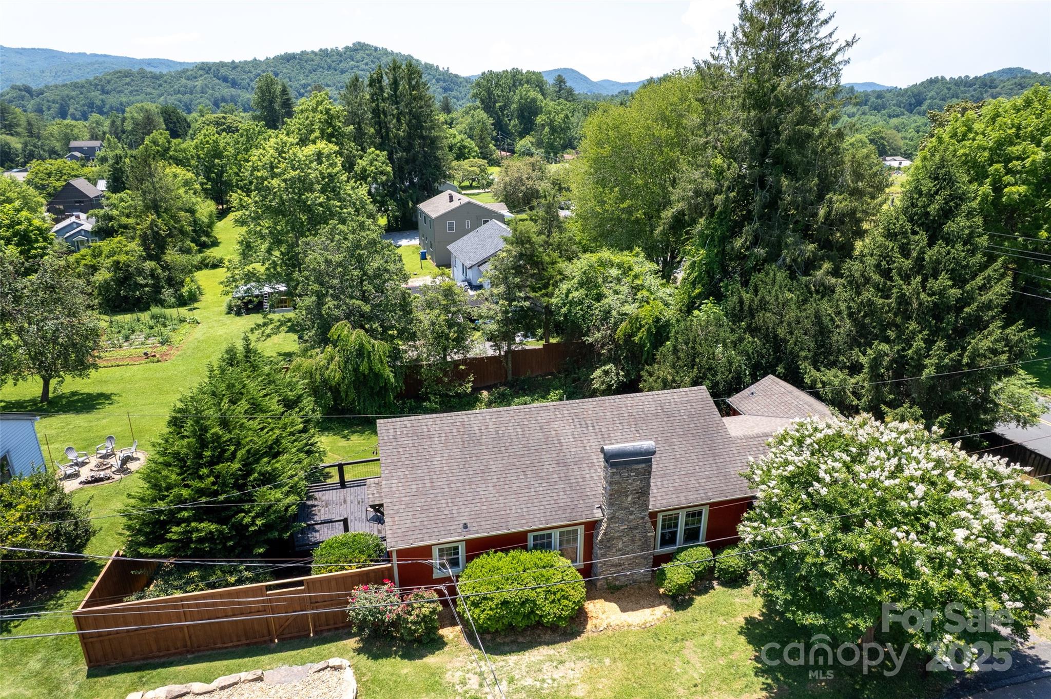 14 Monroe Street Brevard, NC 28712 - Photo 5 of 48 an aerial view of a house