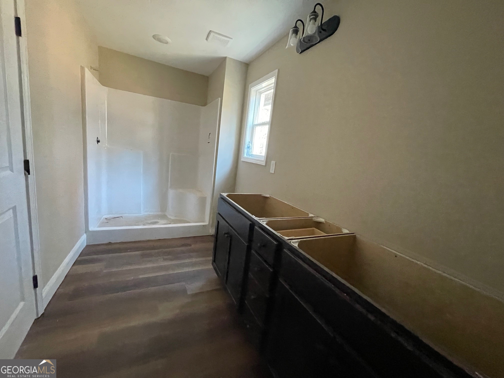 187 Coffey Road Barnesville, GA 30204 - Photo 11 of 27 a room with storage and utility