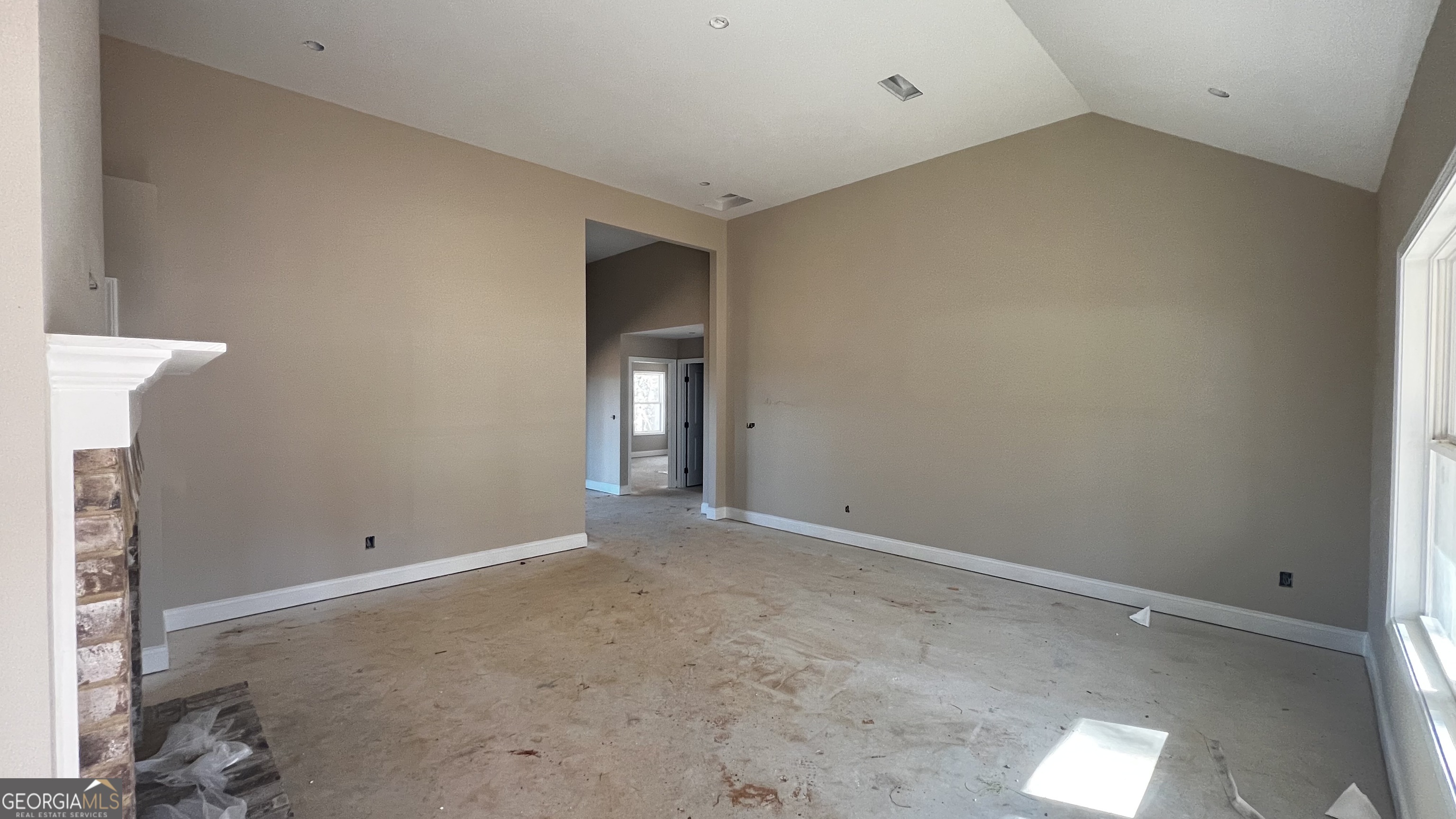 187 Coffey Road Barnesville, GA 30204 - Photo 14 of 27 a view of an empty room with a window