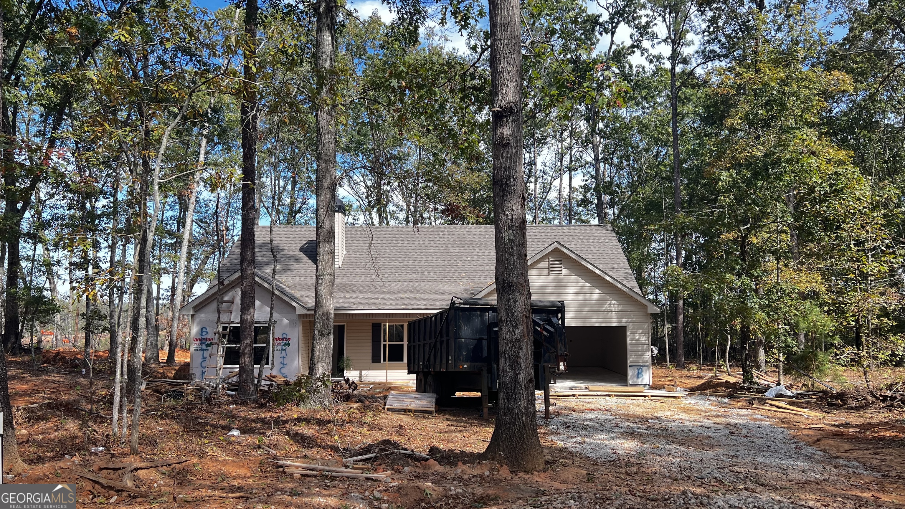 187 Coffey Road Barnesville, GA 30204 - Photo 17 of 27 a front view of a house with a tree