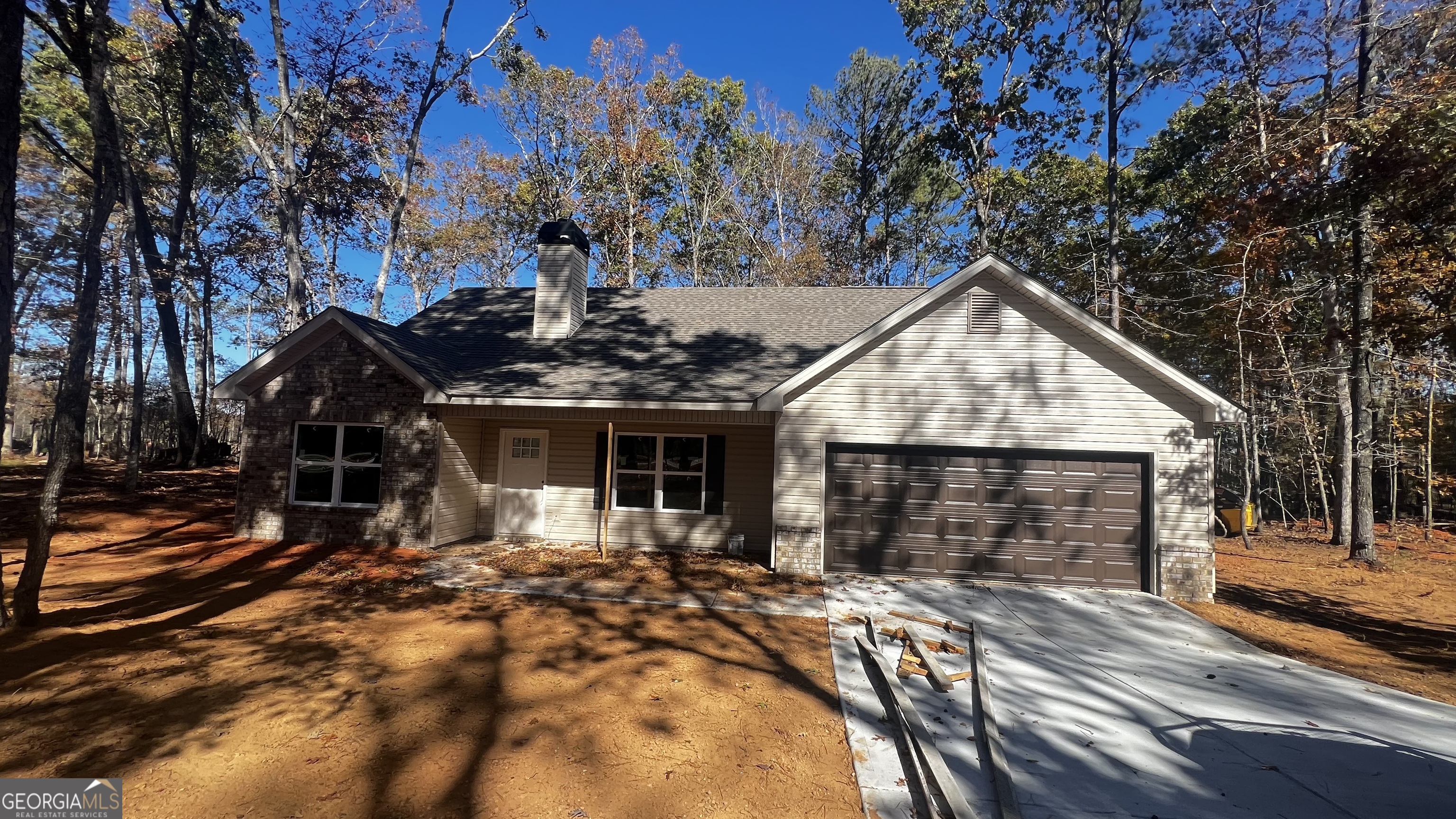 187 Coffey Road Barnesville, GA 30204 - Photo 27 of 27 a front view of house with a garden
