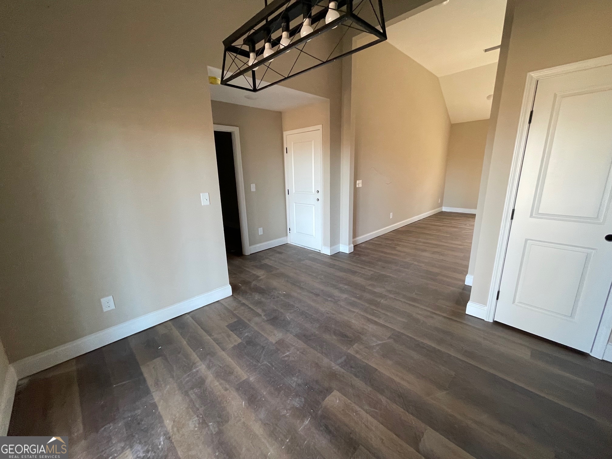 187 Coffey Road Barnesville, GA 30204 - Photo 5 of 27 a view of a hallway with wooden floor