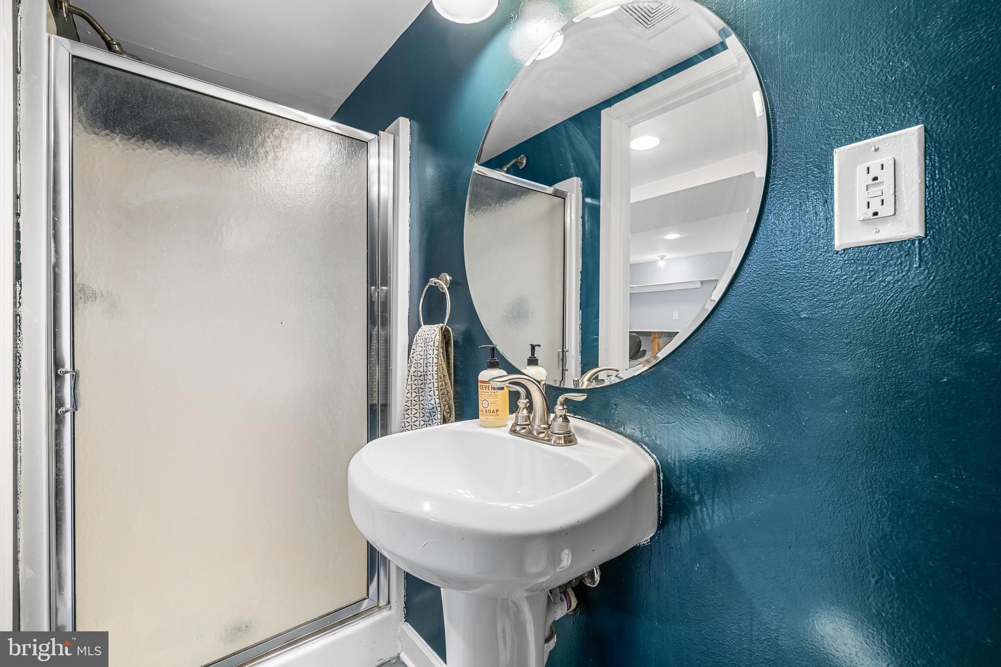 1620 Hardwick Road Towson, MD 21286 - Photo 33 of 38 a bathroom with a sink and a mirror