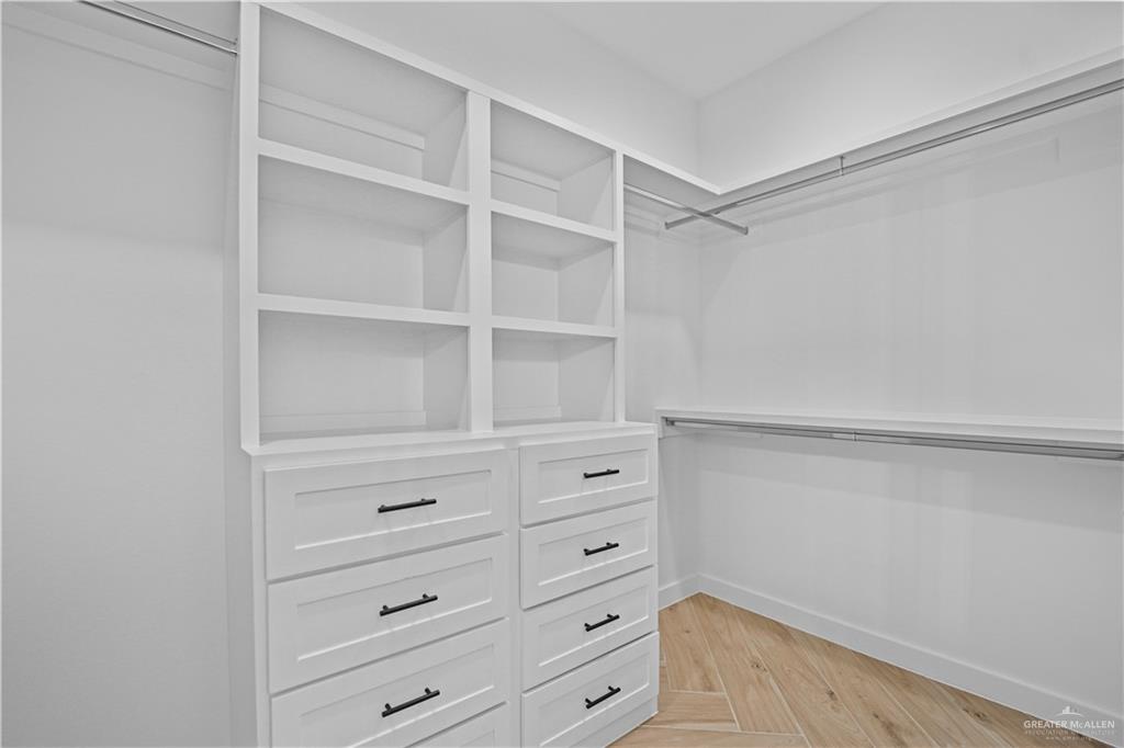 2728 East Conroe Road Edinburg, TX 78542 - Photo 9 of 14 a view of an empty walk in closet