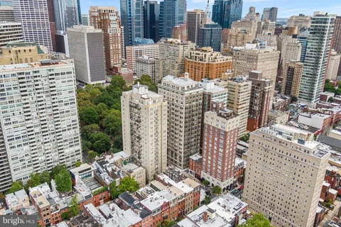 a view of a city with tall buildings