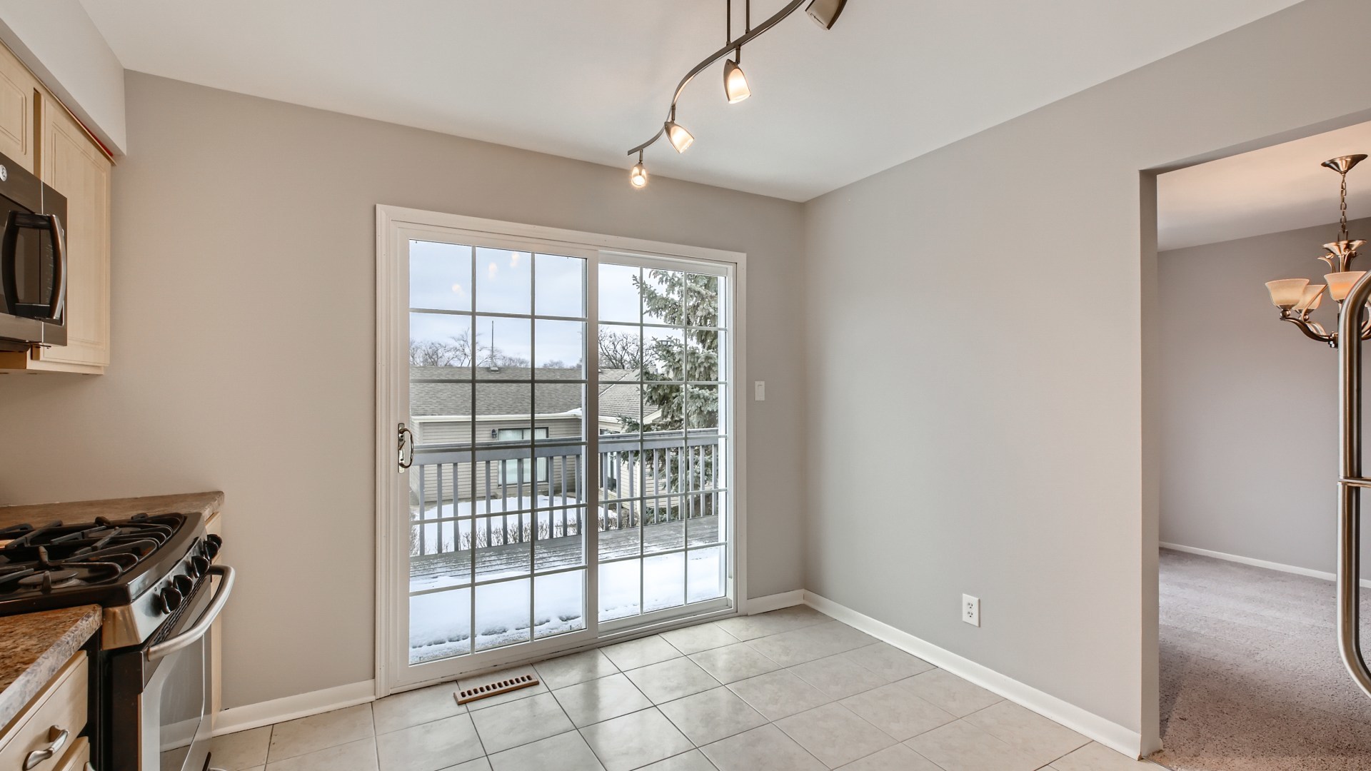 17 Windgate Court Streamwood, IL 60107 - Photo 12 of 28 a view of an empty room with a window