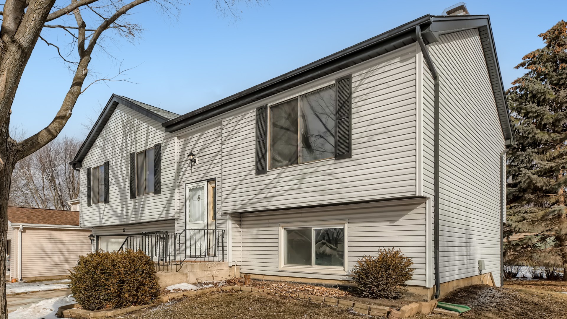 17 Windgate Court Streamwood, IL 60107 - Photo 2 of 28 a view of a house with a street