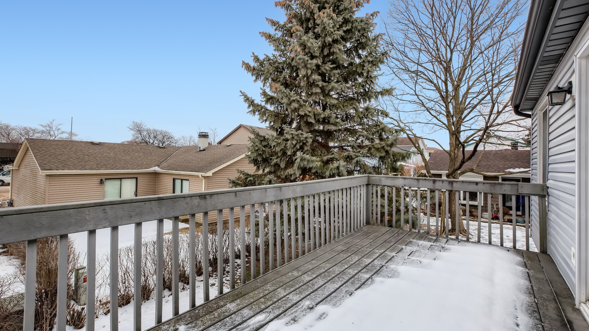 17 Windgate Court Streamwood, IL 60107 - Photo 25 of 28 a view of a wooden roof deck