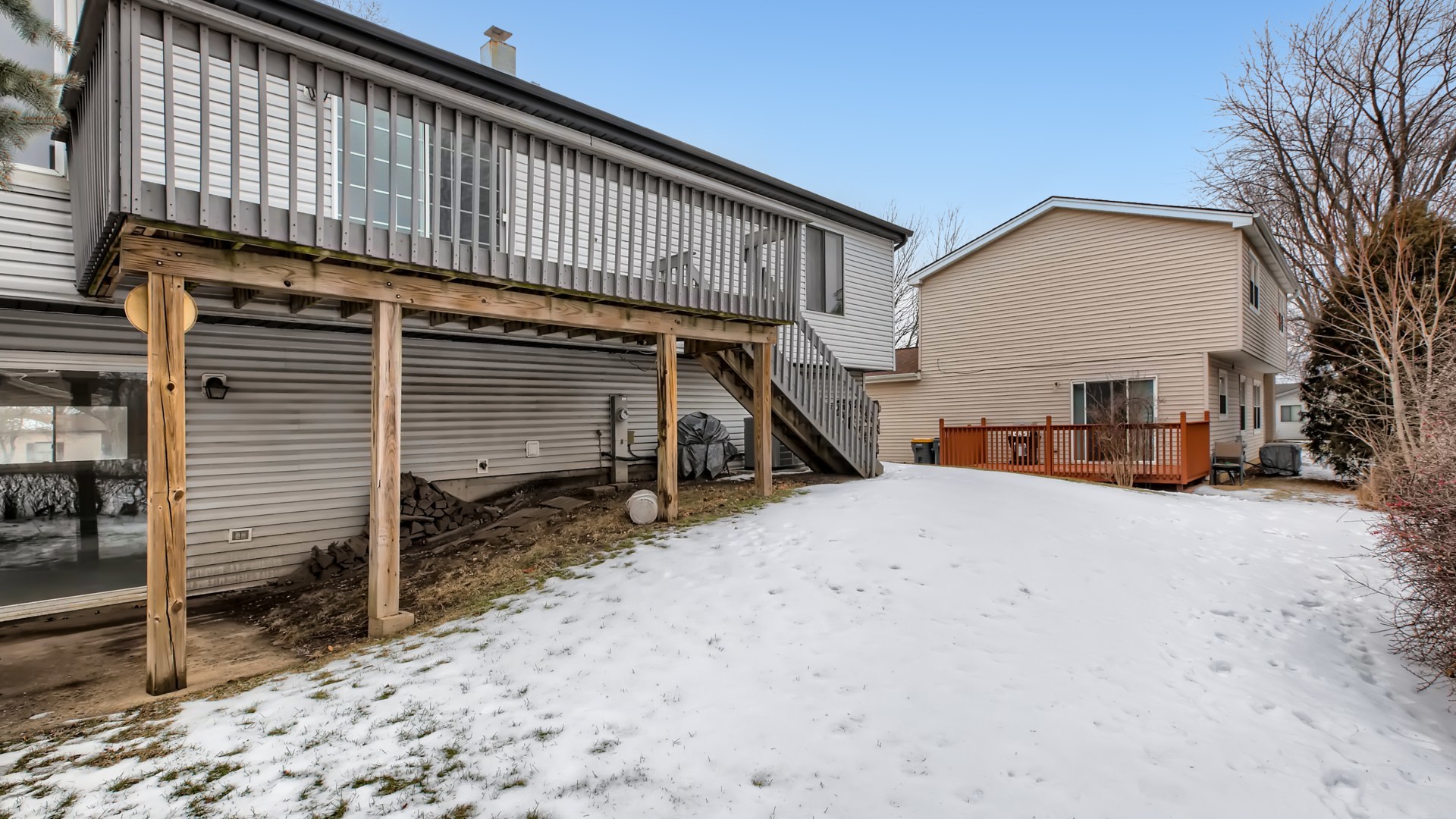 17 Windgate Court Streamwood, IL 60107 - Photo 28 of 28 a view of a house with a roof deck