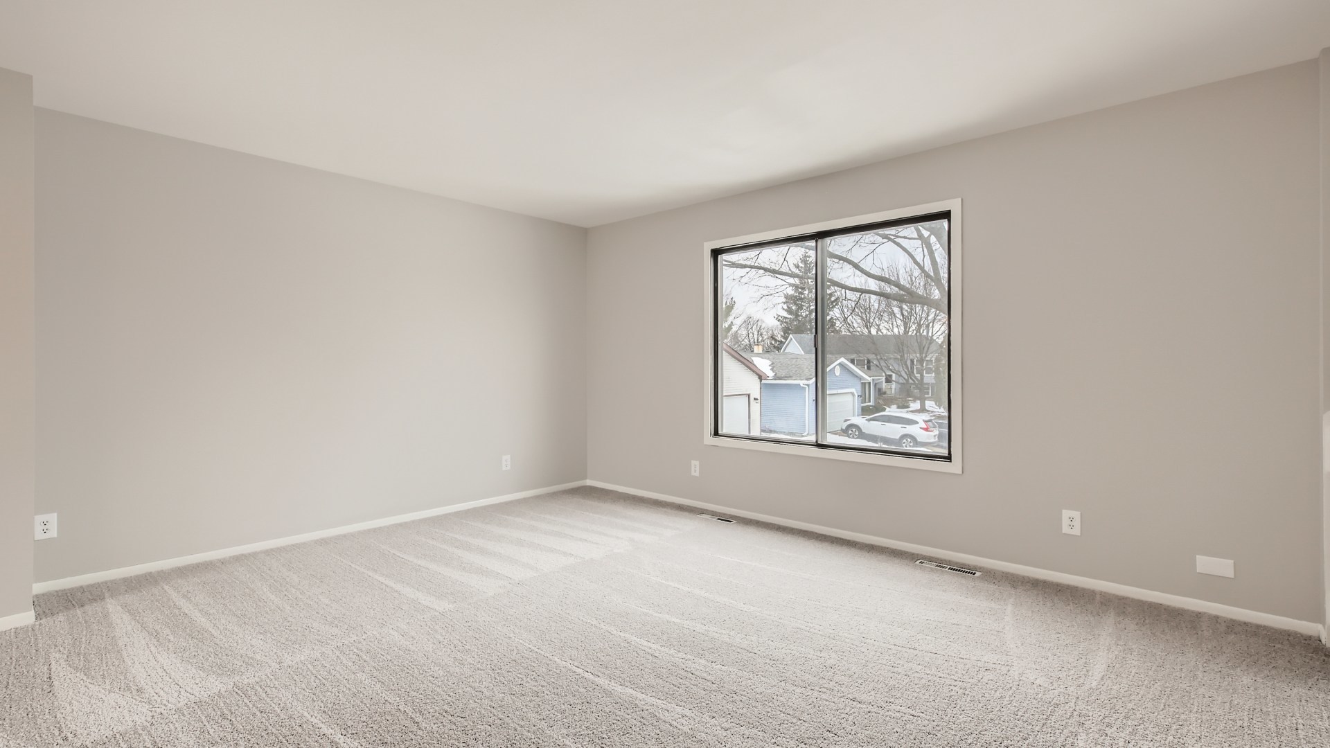 17 Windgate Court Streamwood, IL 60107 - Photo 5 of 28 an empty room with windows