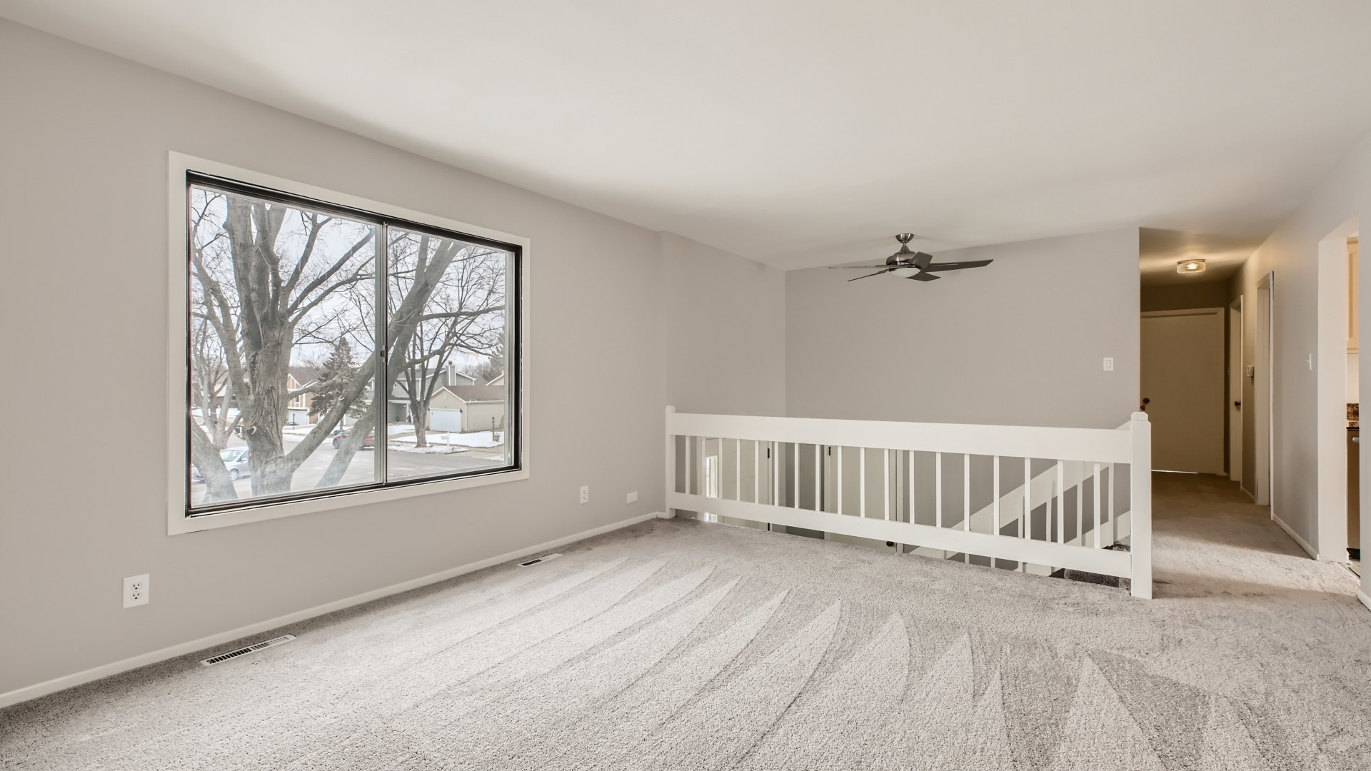 17 Windgate Court Streamwood, IL 60107 - Photo 7 of 28 an empty room with windows