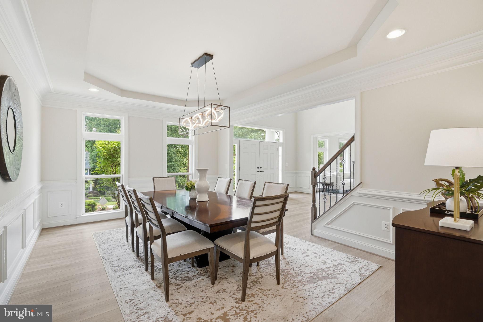 7821 Old Falls Road McLean, VA 22102 - Photo 12 of 62 a view of a dining room with furniture window and wooden floor