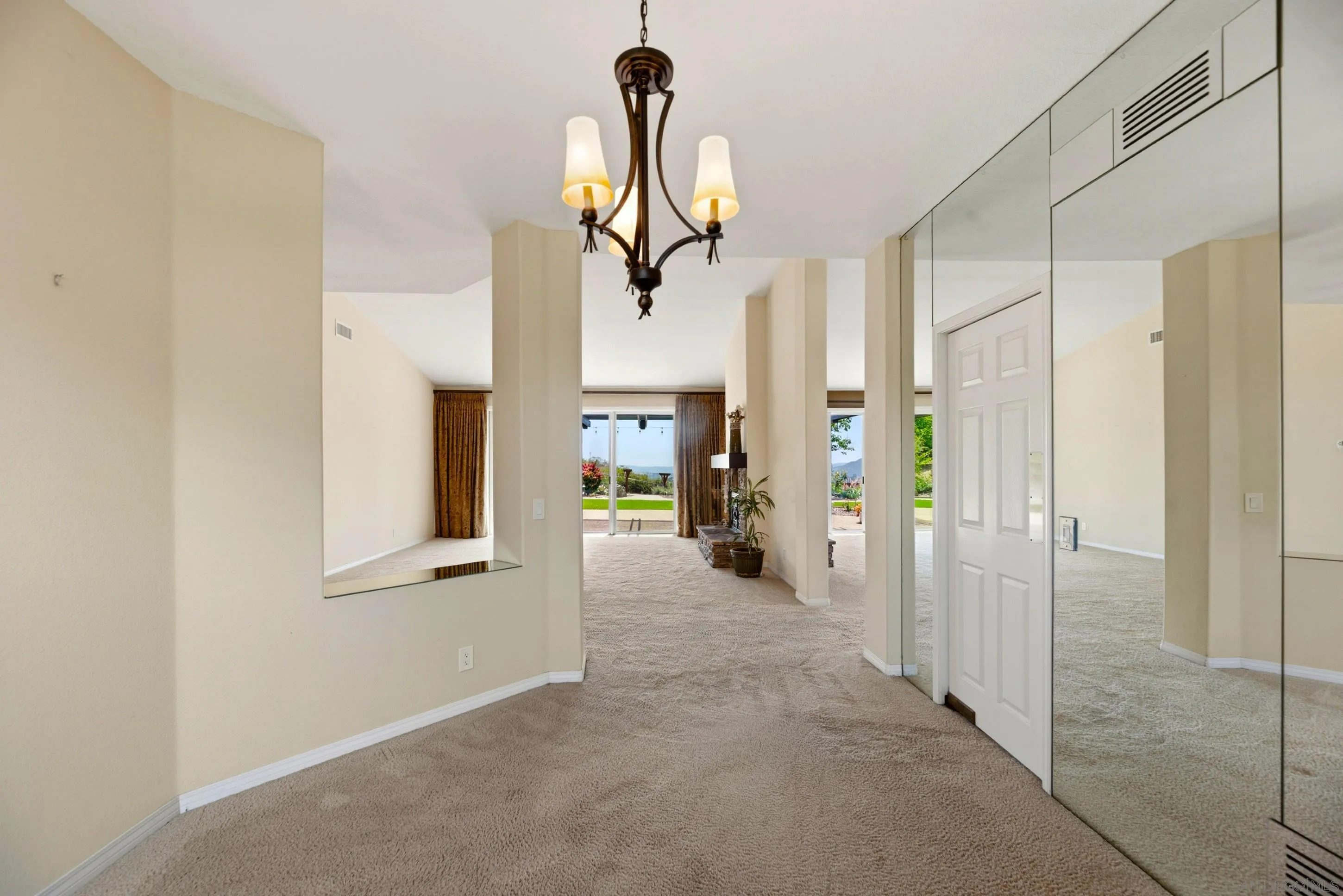 14505 Wildgrove Road Poway, CA 92064 - Photo 18 of 55 a view of a livingroom with a chandelier