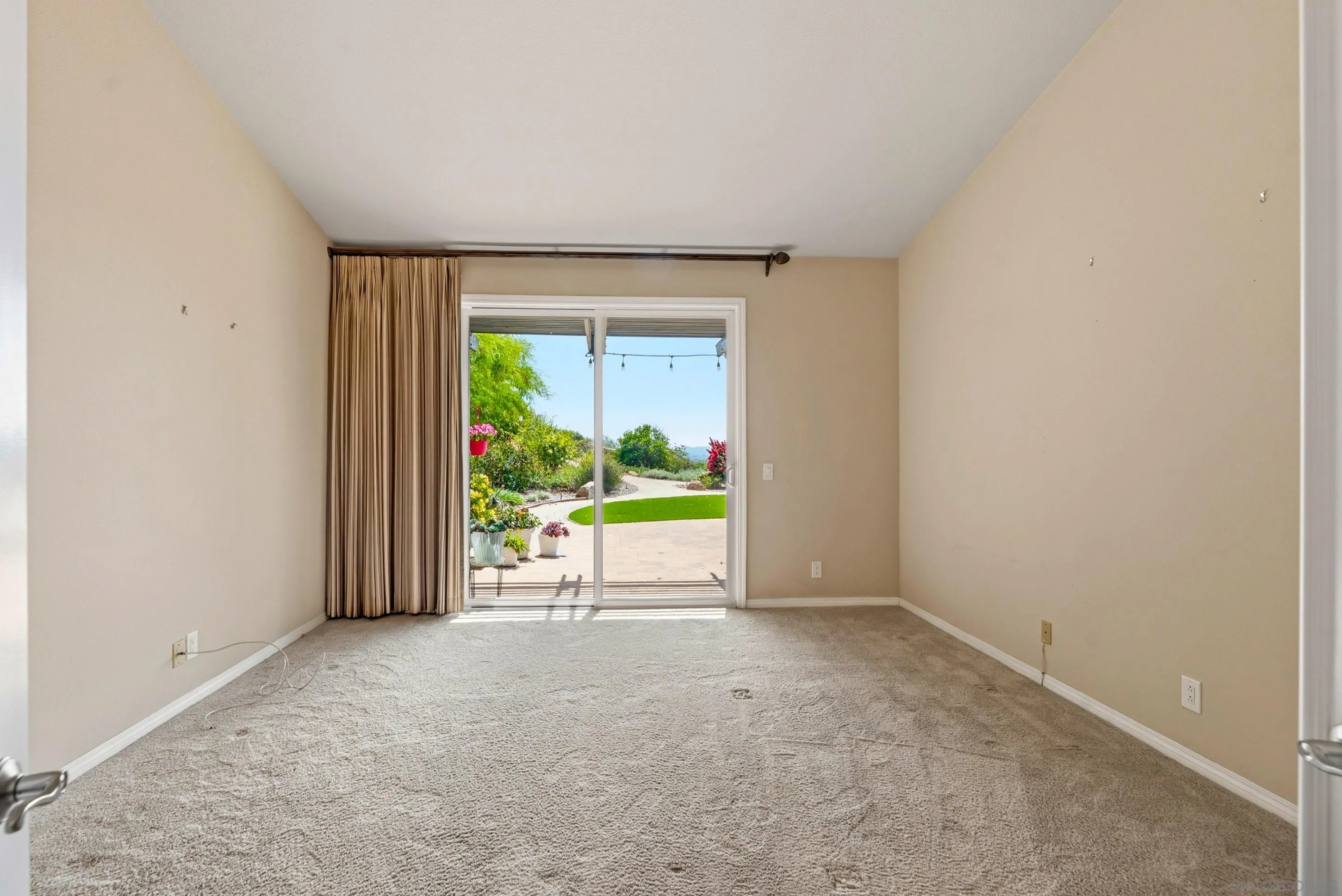 14505 Wildgrove Road Poway, CA 92064 - Photo 21 of 55 a view of an empty room with a window
