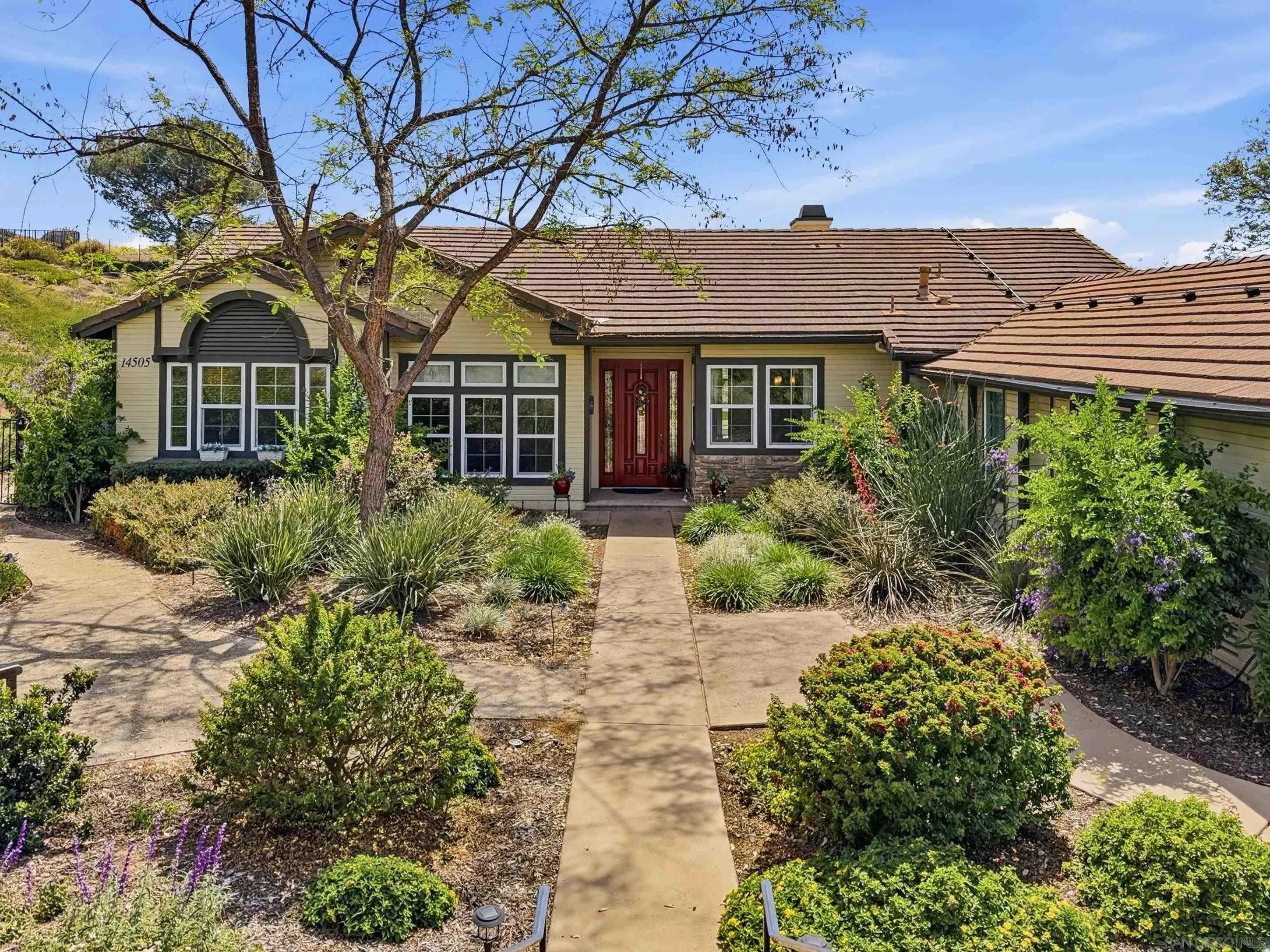 14505 Wildgrove Road Poway, CA 92064 - Photo 3 of 55 front view of a house with a garden
