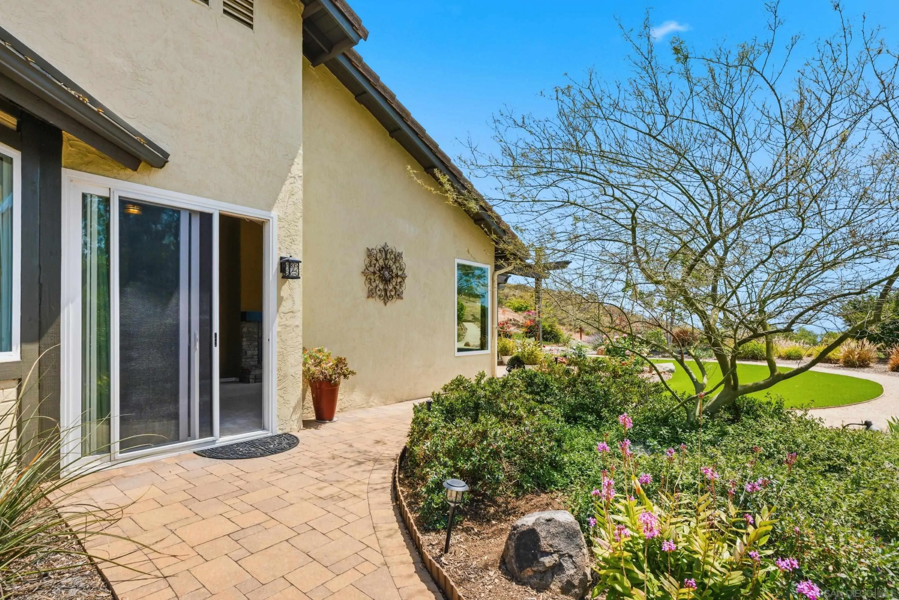 14505 Wildgrove Road Poway, CA 92064 - Photo 33 of 55 a front view of a house with garden