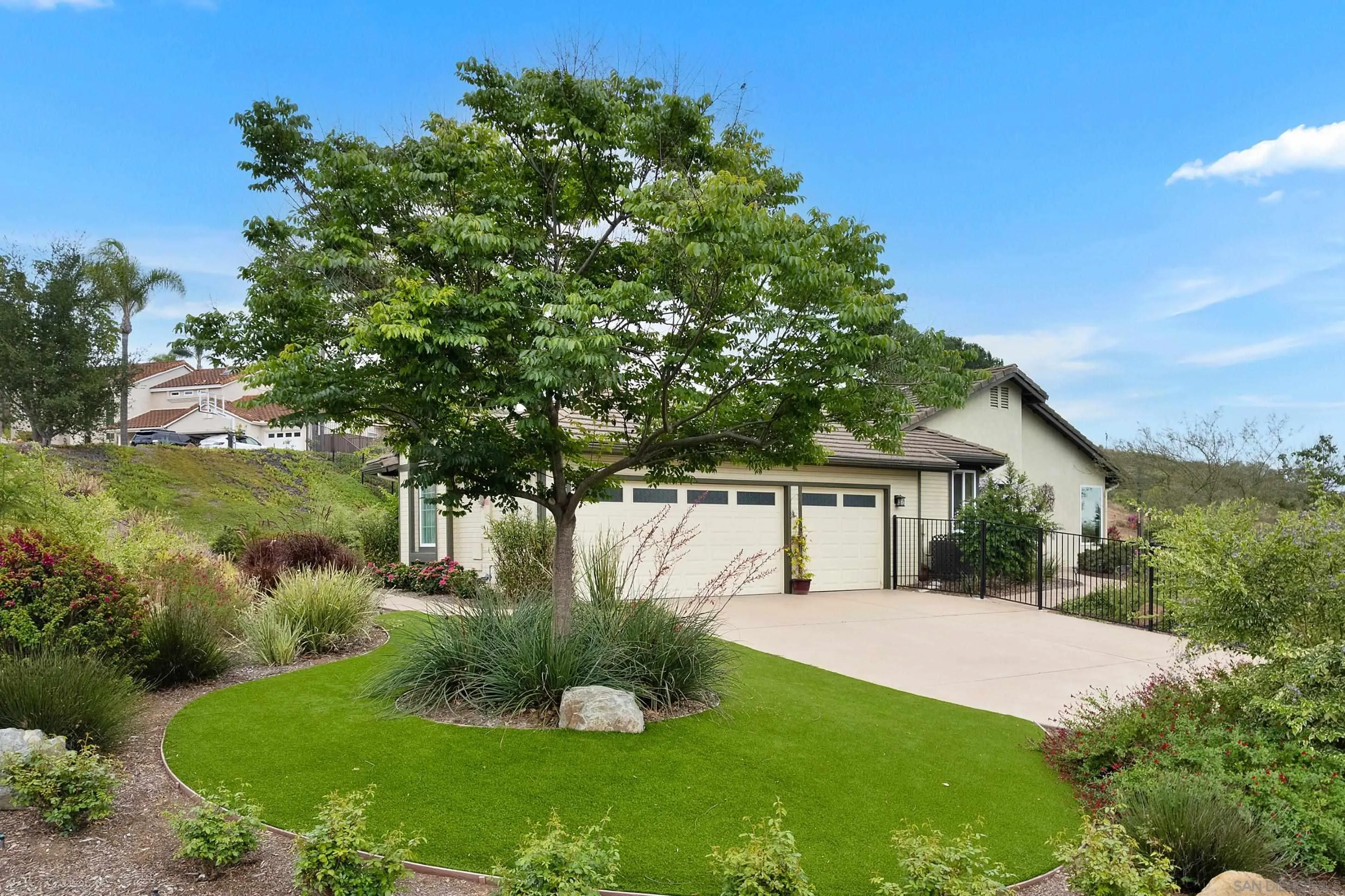 14505 Wildgrove Road Poway, CA 92064 - Photo 40 of 55 a view of a house with a yard