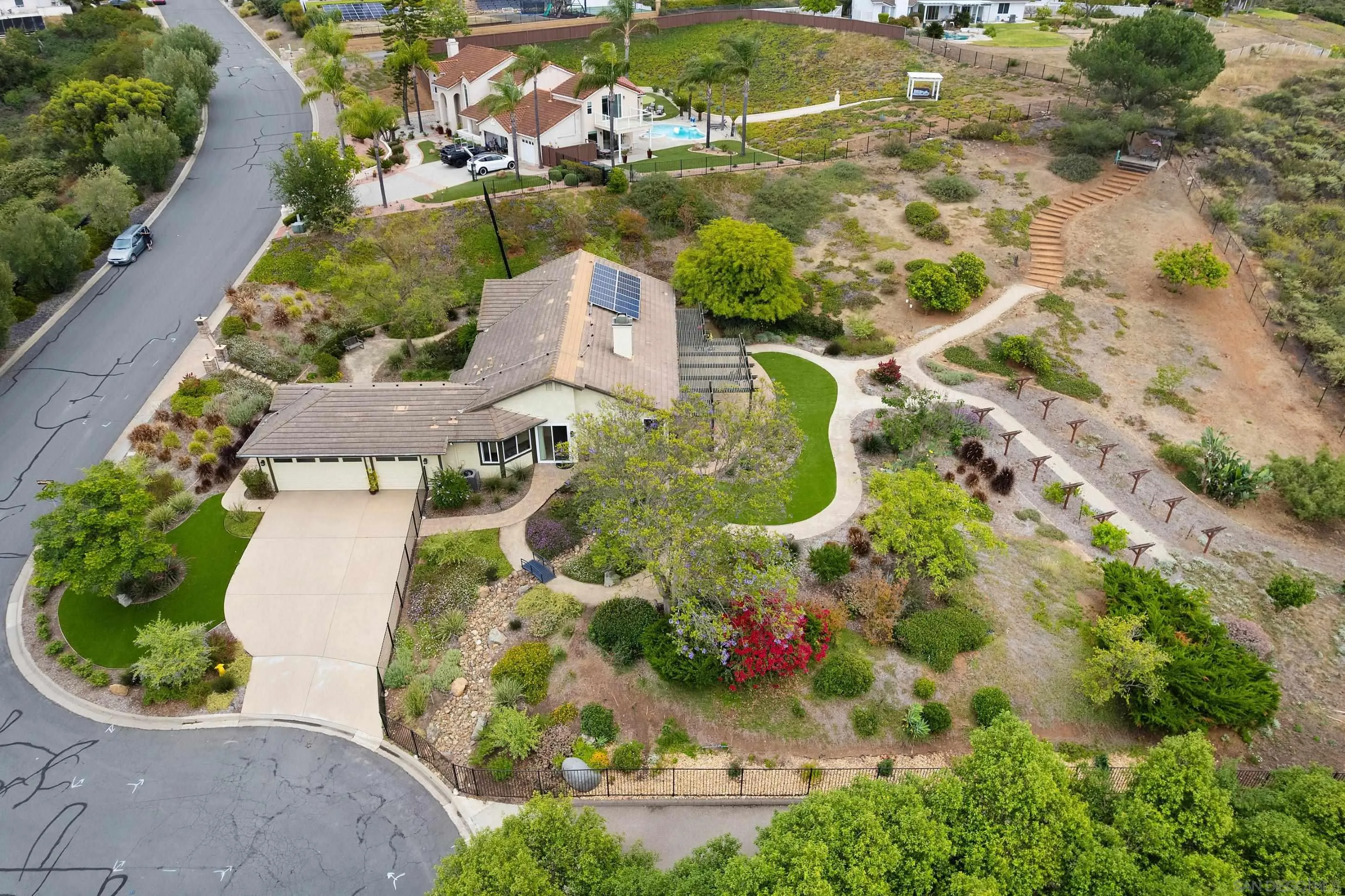 14505 Wildgrove Road Poway, CA 92064 - Photo 44 of 55 an aerial view of a house with a yard and lake view