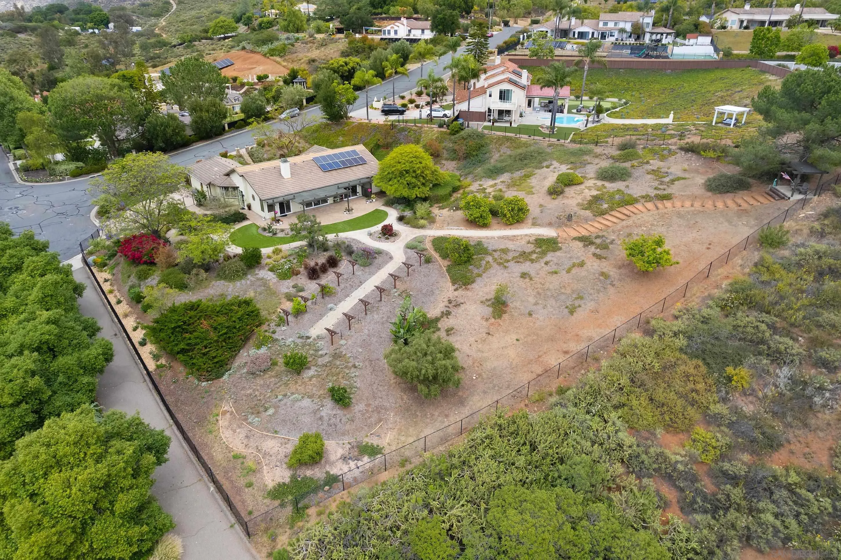 14505 Wildgrove Road Poway, CA 92064 - Photo 45 of 55 an aerial view of residential houses with outdoor space