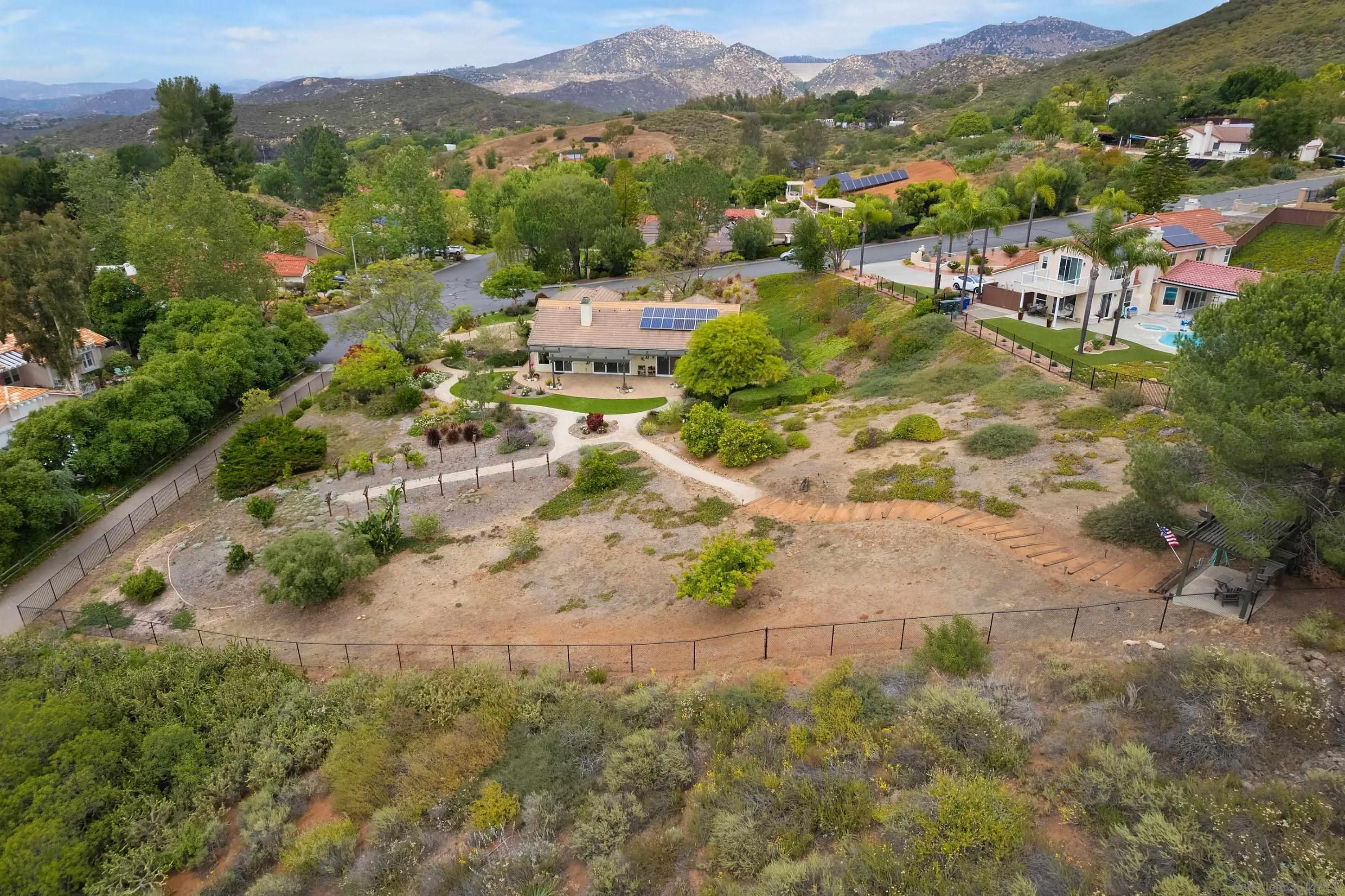 14505 Wildgrove Road Poway, CA 92064 - Photo 46 of 55 an aerial view of residential houses with outdoor space and trees