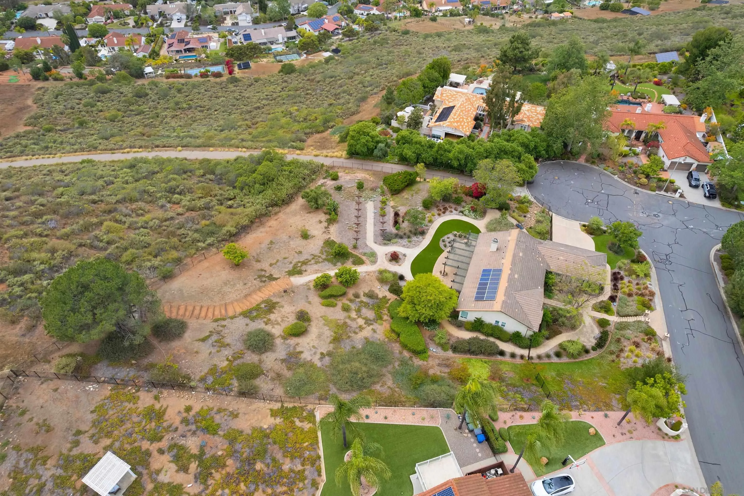 14505 Wildgrove Road Poway, CA 92064 - Photo 47 of 55 an aerial view of residential houses with outdoor space