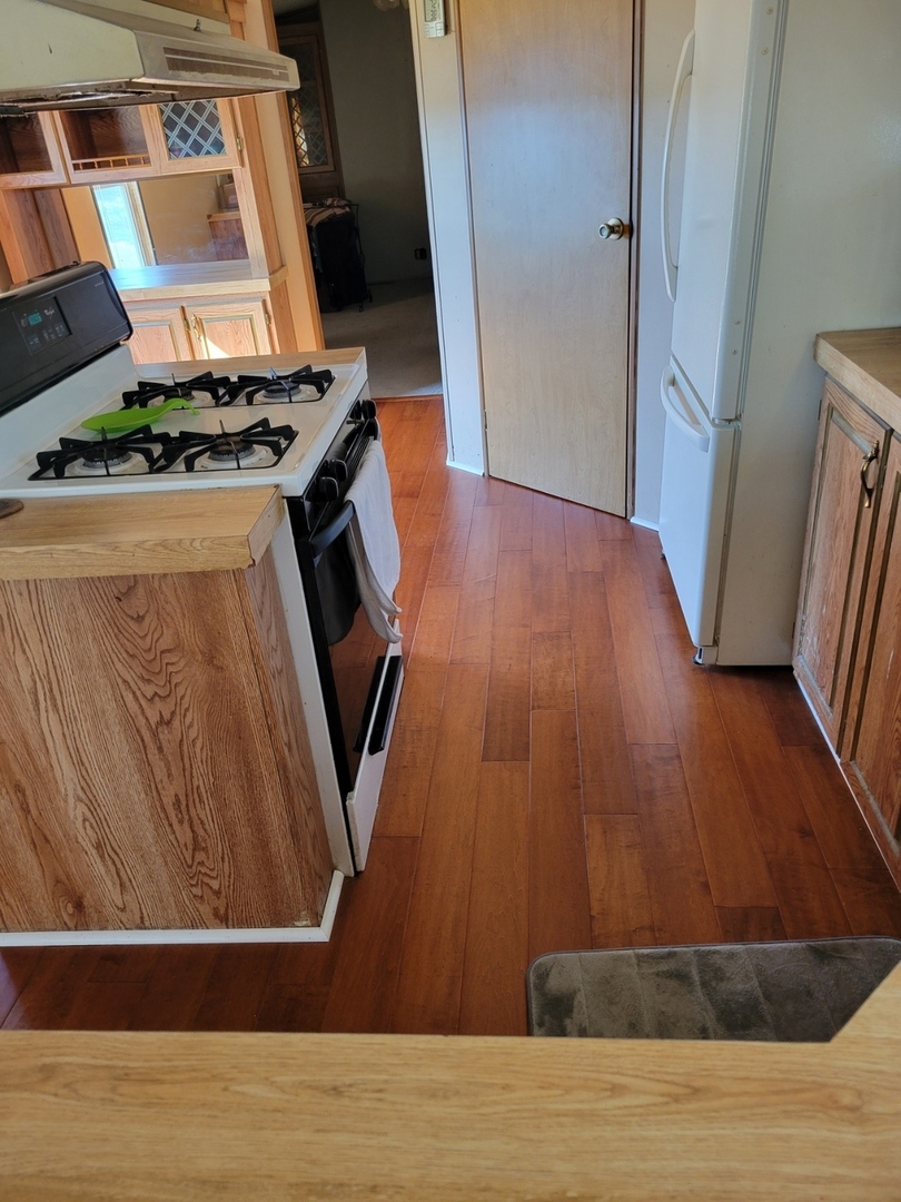 3 Drake Lane, Unit 3DRA Beecher, IL 60401 - Photo 16 of 18 a view of a kitchen from an empty room