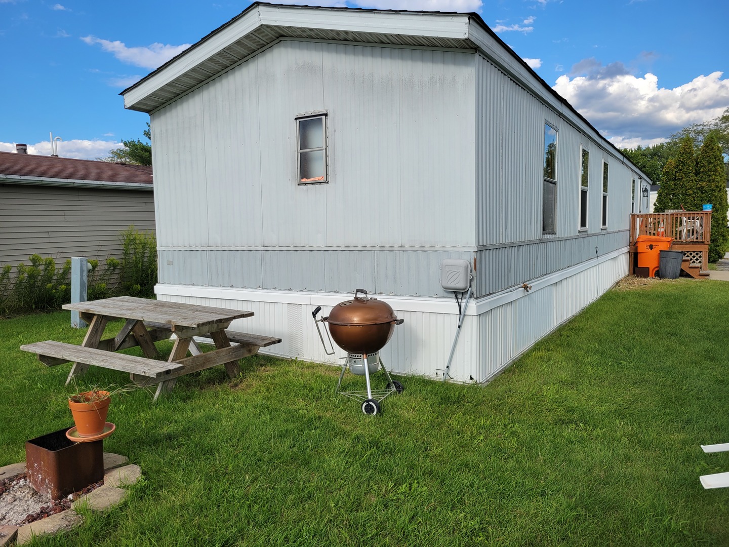 3 Drake Lane, Unit 3DRA Beecher, IL 60401 - Photo 3 of 18 a view of a backyard with table and chairs