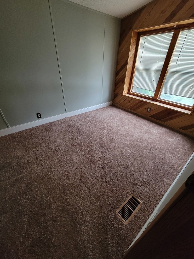 3 Drake Lane, Unit 3DRA Beecher, IL 60401 - Photo 8 of 18 an empty room with a window