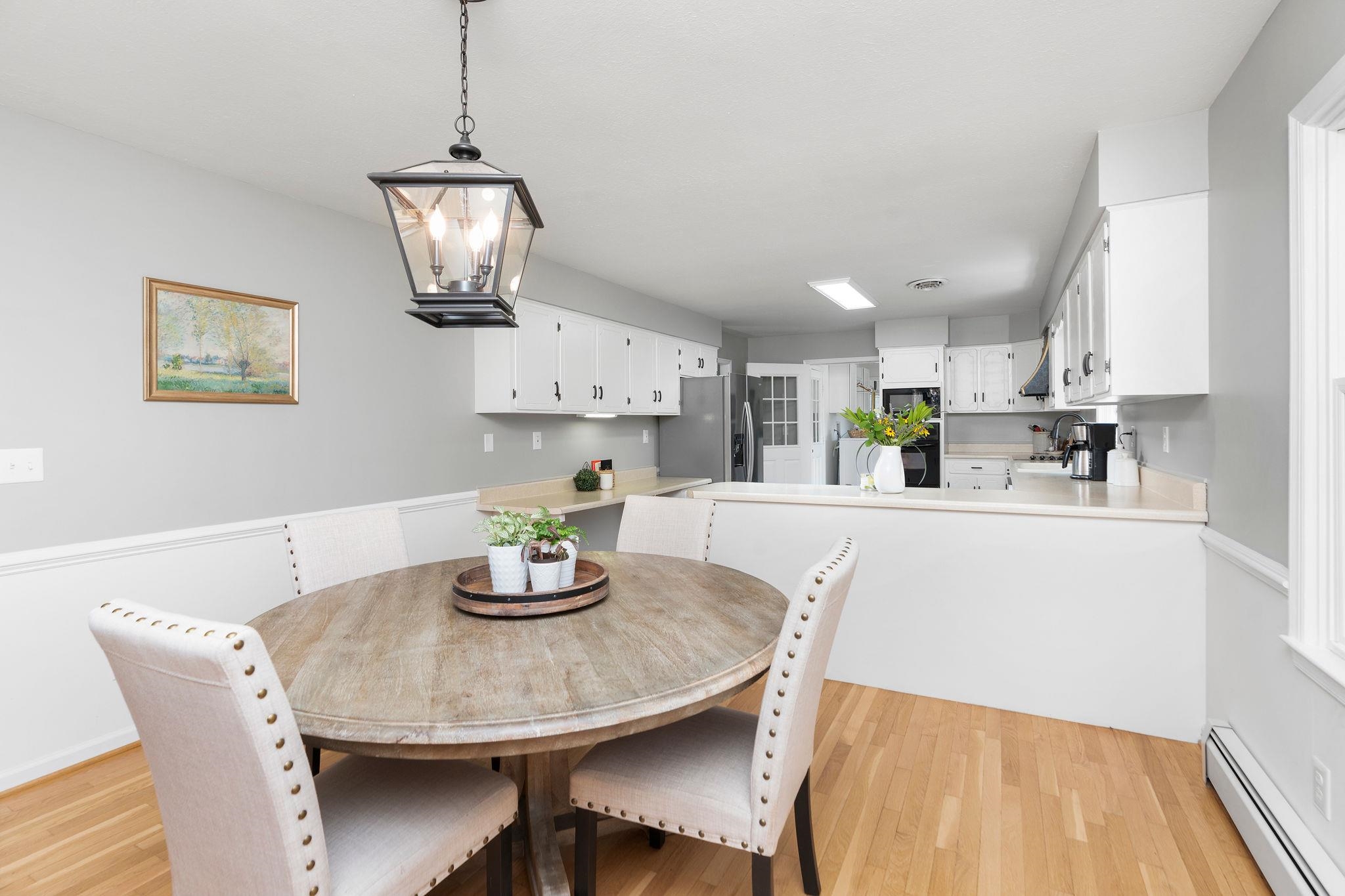 192 Galena Road Staunton, VA 24401 - Photo 15 of 75 a kitchen with a dining table and chairs