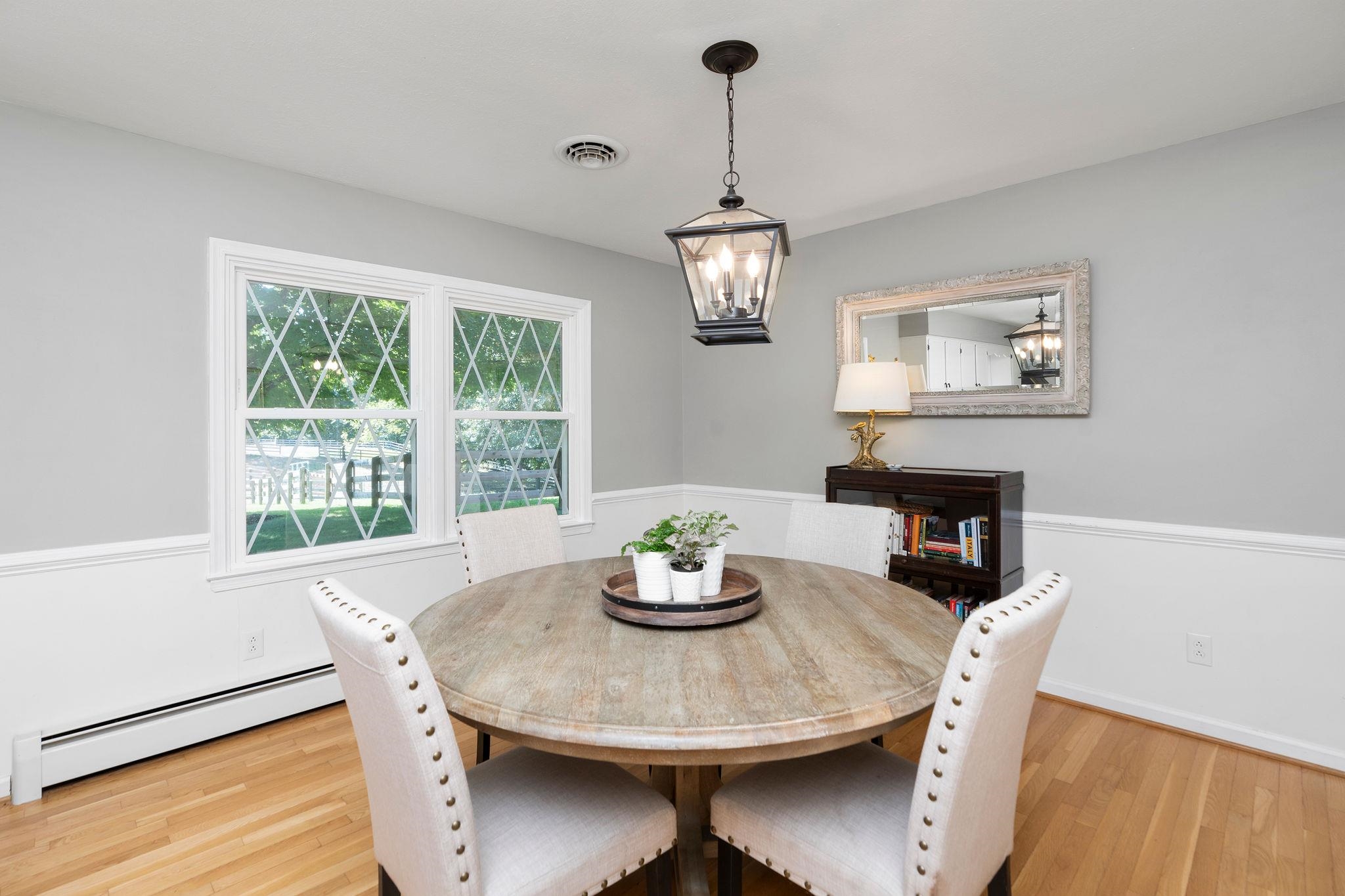 192 Galena Road Staunton, VA 24401 - Photo 16 of 75 a dining room with furniture a window and wooden floor