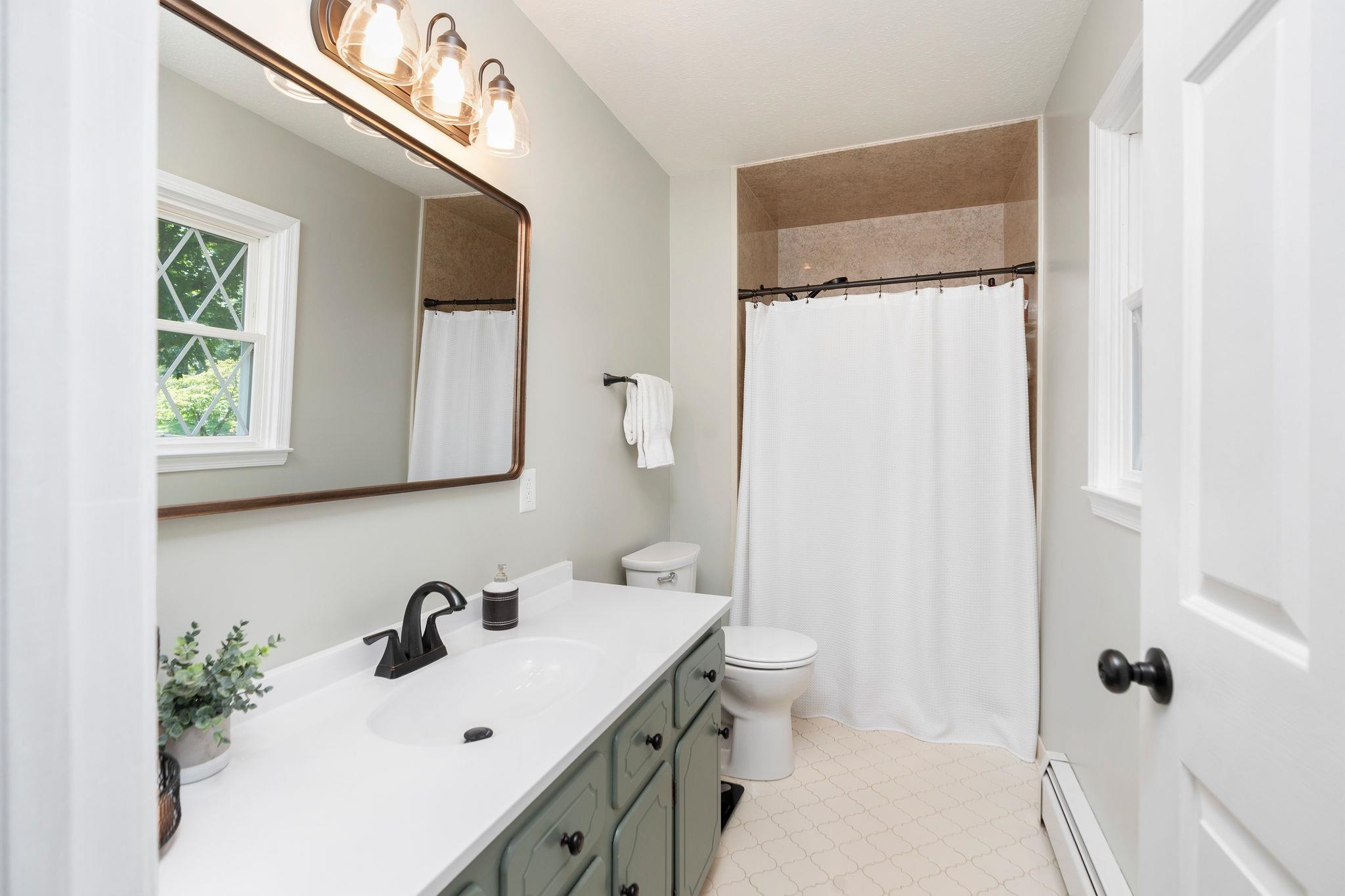 192 Galena Road Staunton, VA 24401 - Photo 21 of 75 a bathroom with a sink toilet and shower