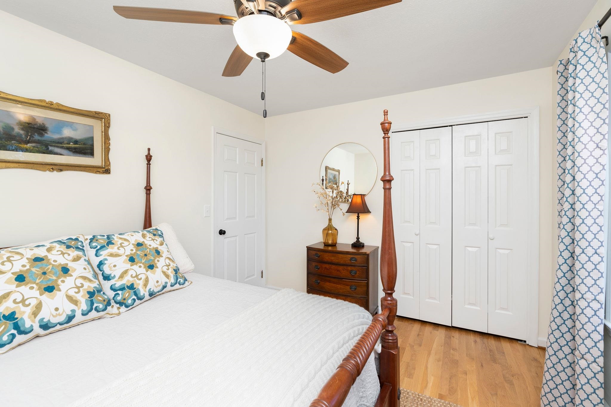 192 Galena Road Staunton, VA 24401 - Photo 24 of 75 a bedroom with a bed and a chandelier