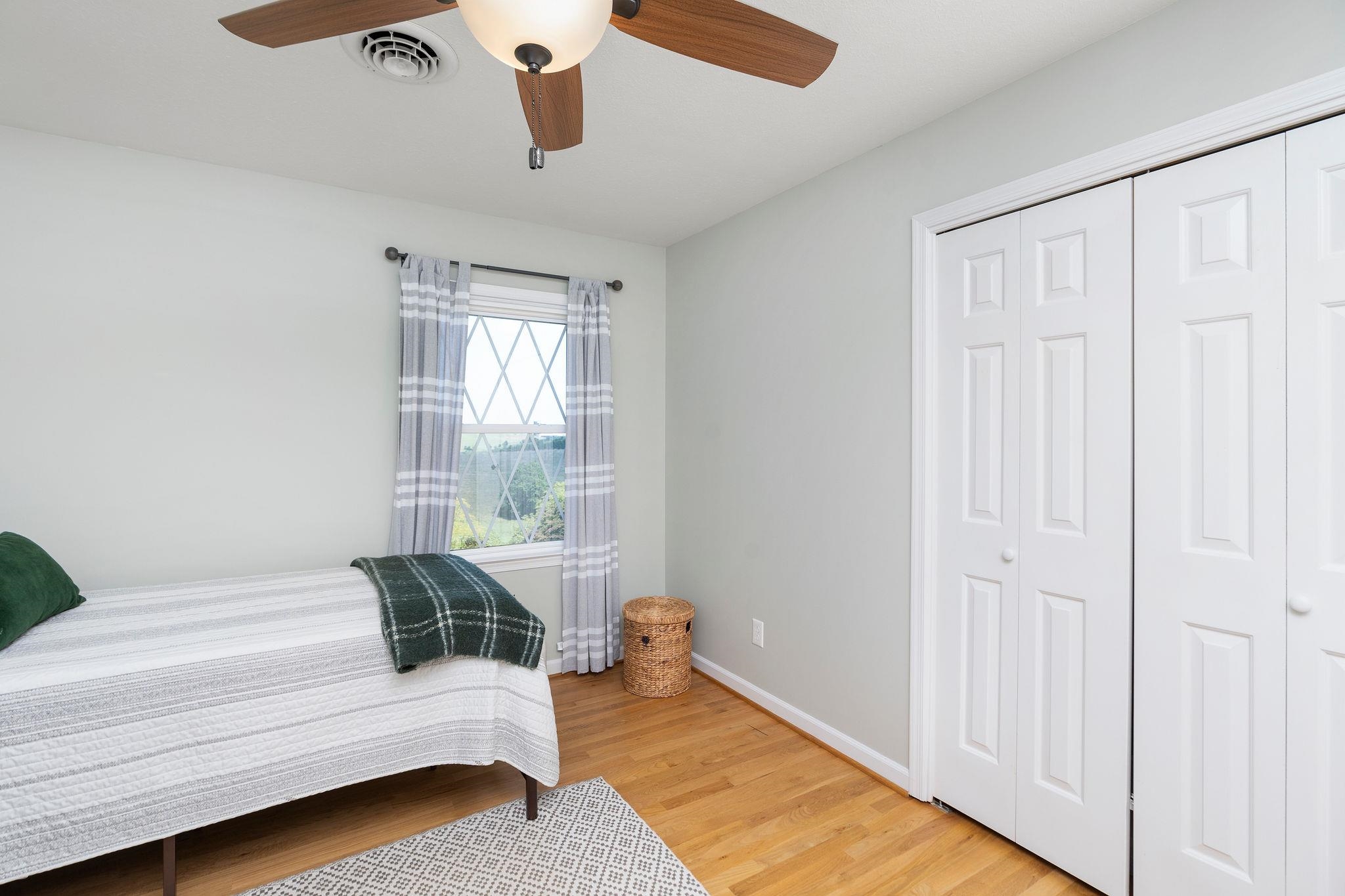 192 Galena Road Staunton, VA 24401 - Photo 28 of 75 a spacious bedroom with a bed and a window
