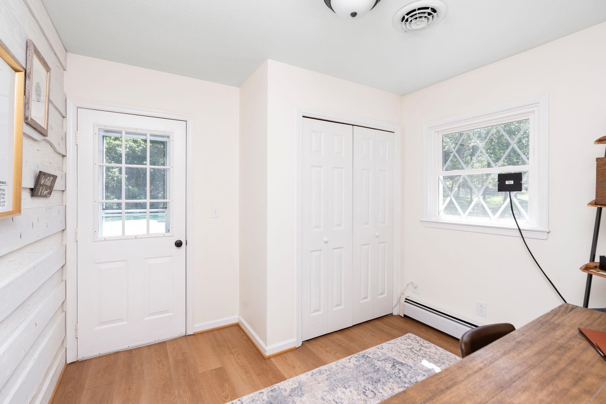 192 Galena Road Staunton, VA 24401 - Photo 32 of 75 a view of an empty room with wooden floor and a window