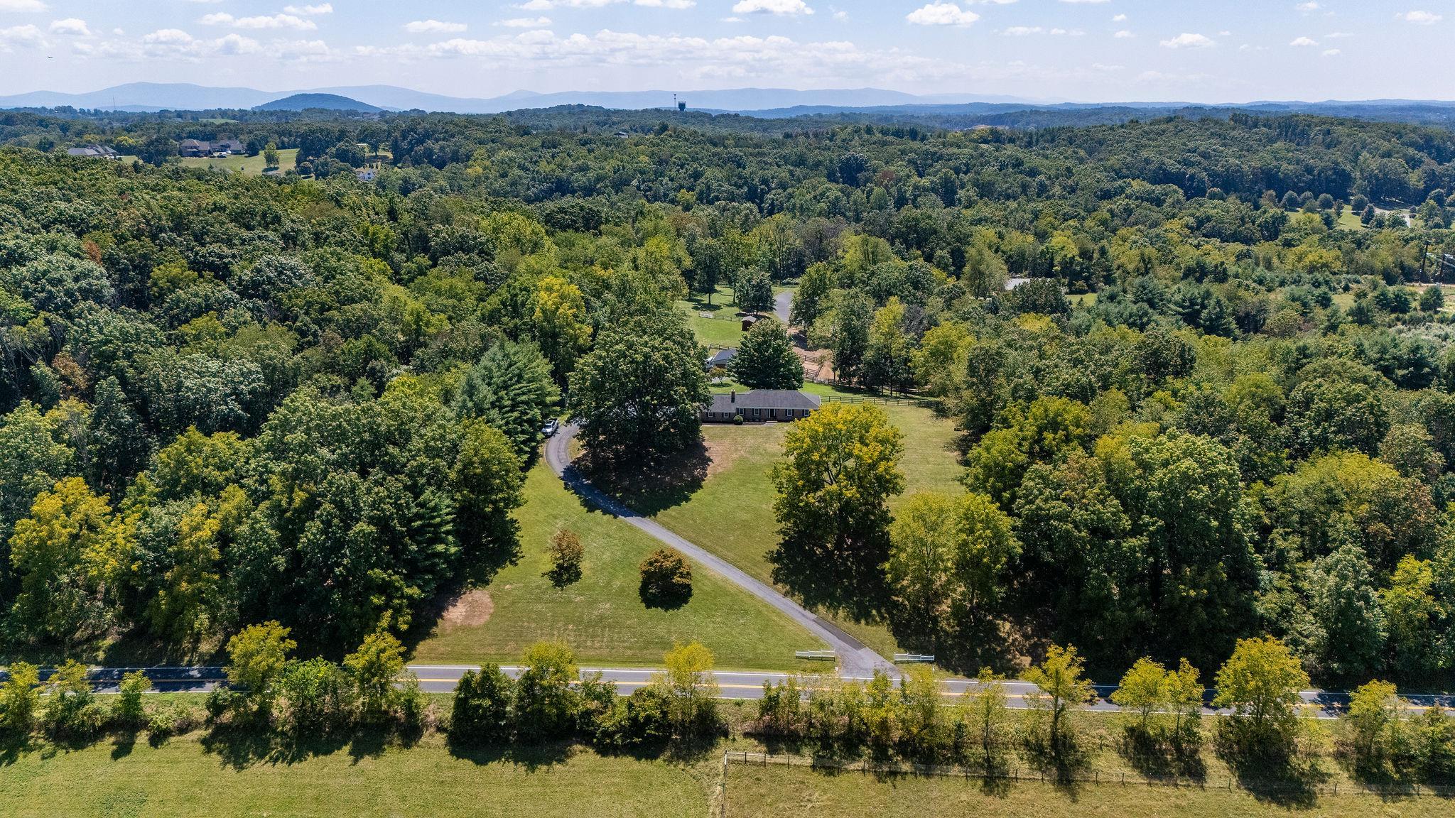 192 Galena Road Staunton, VA 24401 - Photo 74 of 75 an aerial view of a house with a yard and lake view
