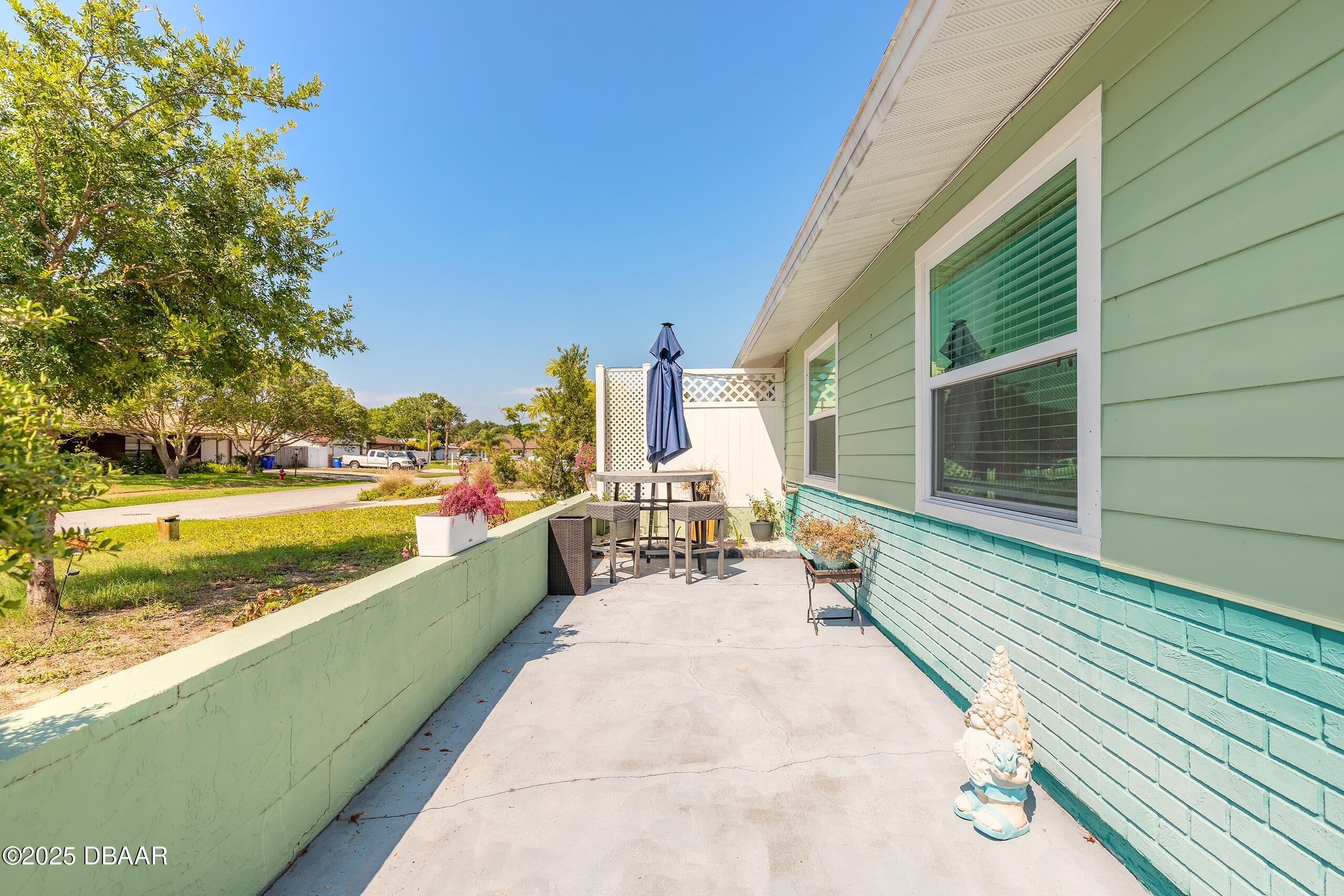 601 Sea Gull Court Edgewater, FL 32141 - Photo 5 of 25 a view of a swimming pool with outdoor seating