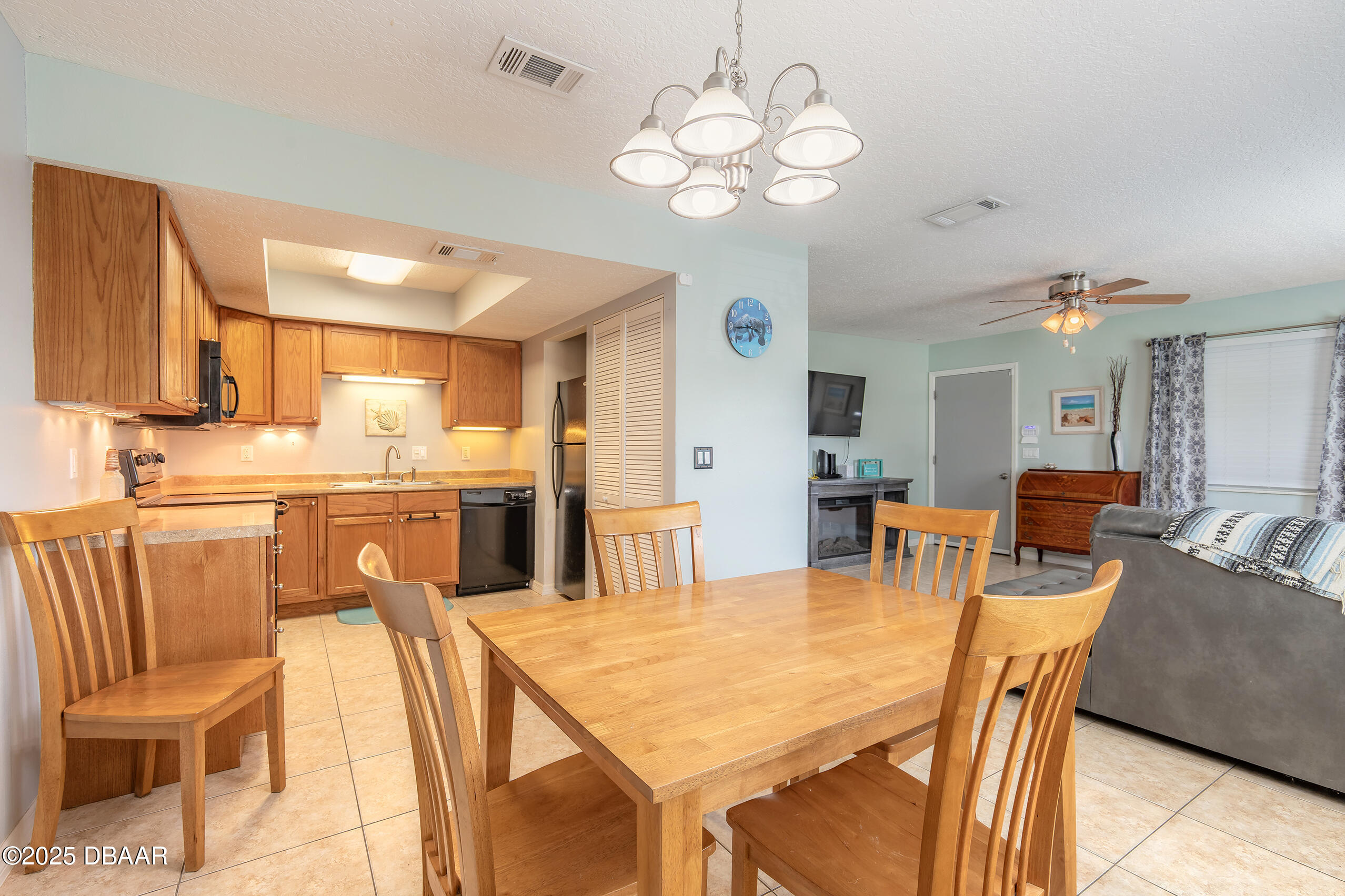 601 Sea Gull Court Edgewater, FL 32141 - Photo 8 of 25 a view of a dining room with furniture and wooden floor