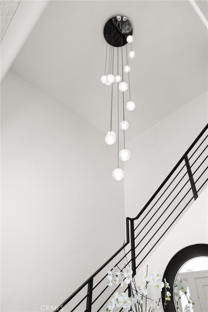 23281 Atlantis Way Dana Point, CA 92629 - Photo 58 of 81 a view of a chandelier and a chandelier fan