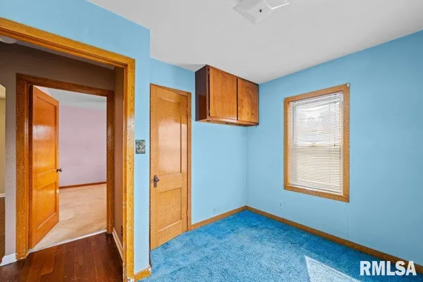 a view of an empty room with window