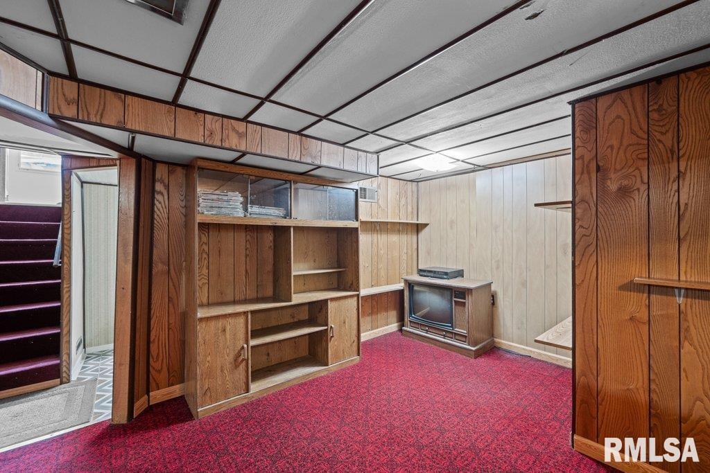 4234 9th Street Rock Island, IL 61201 - Photo 16 of 22 a view of an empty room with a fireplace