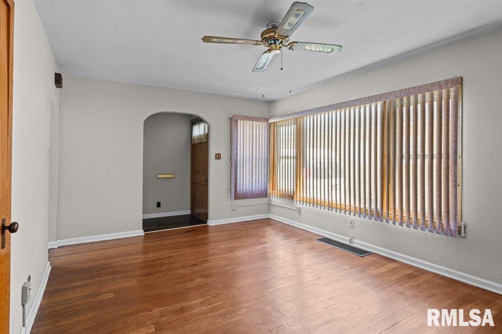 4234 9th Street Rock Island, IL 61201 - Photo 2 of 22 a view of an empty room with a window