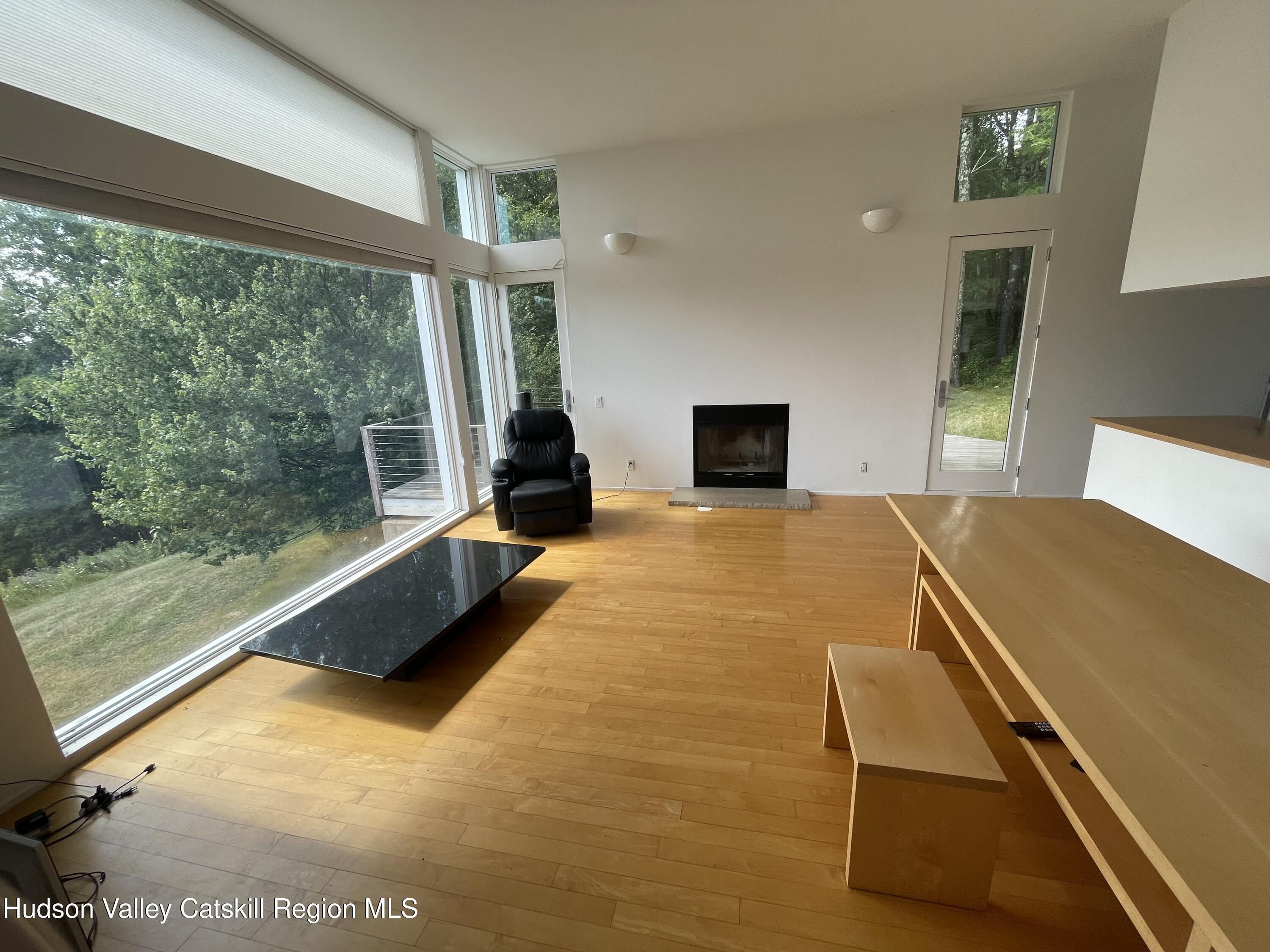 156 Mercer Mountain Road Canaan, NY 12060 - Photo 12 of 28 a bed room with a bed and large window