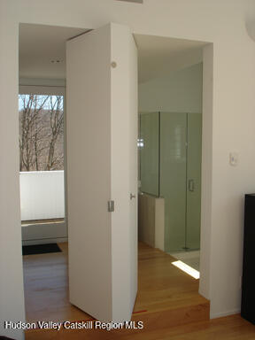 156 Mercer Mountain Road Canaan, NY 12060 - Photo 26 of 28 a view of a bathroom from a hallway
