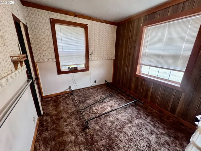 a view of front door and yard