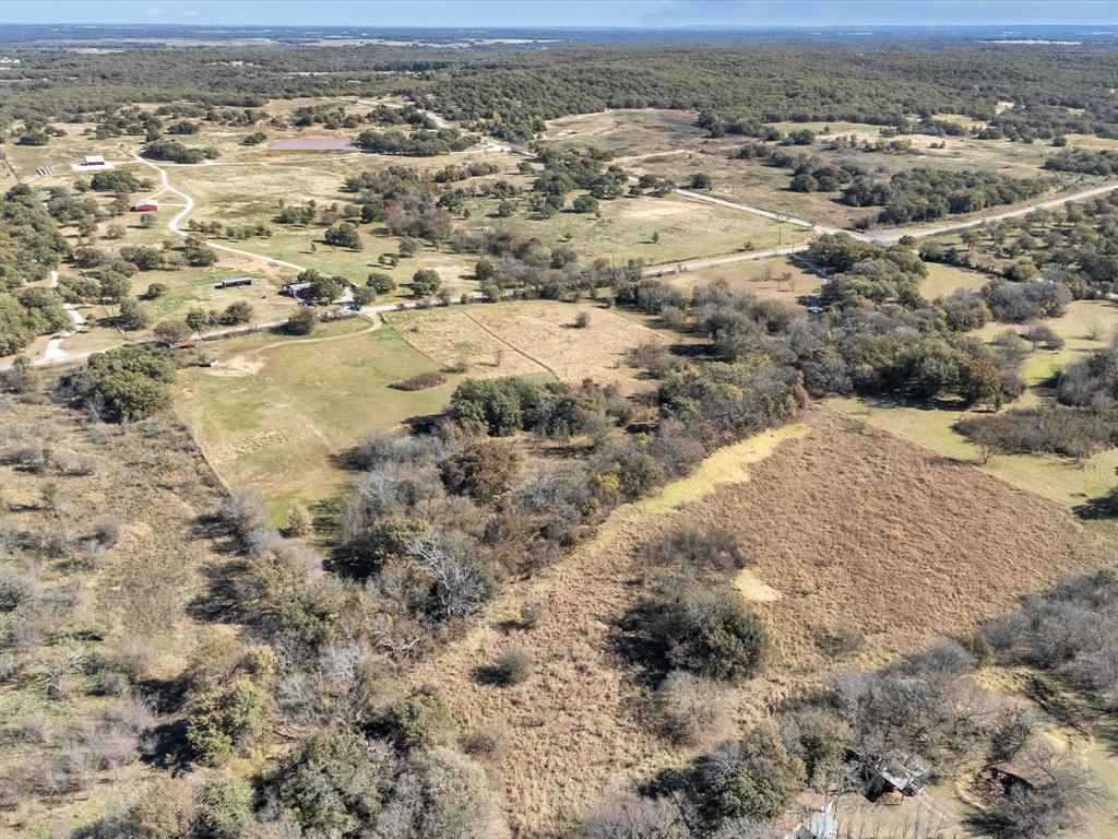 6334 Barrel Springs Road Nocona, TX 76255 - Photo 26 of 34 an aerial view of beach with yard