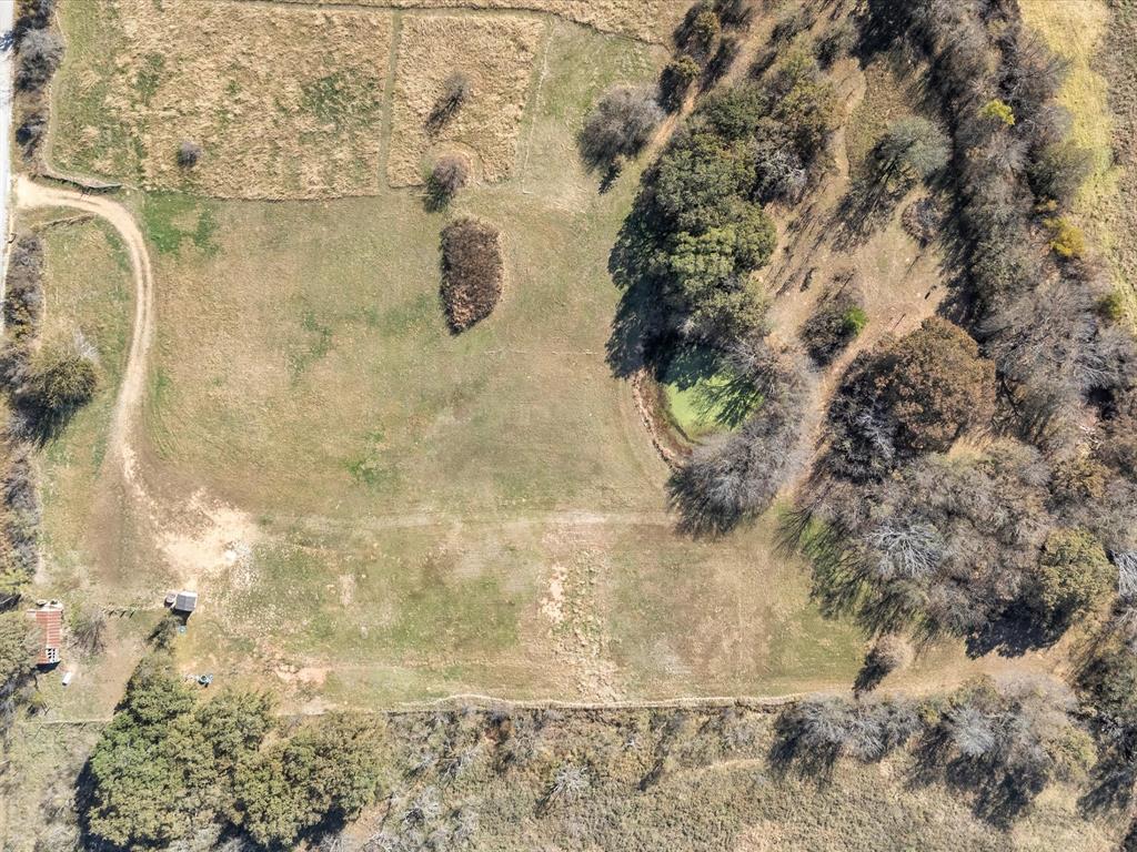 6334 Barrel Springs Road Nocona, TX 76255 - Photo 29 of 34 a bathroom with a shower