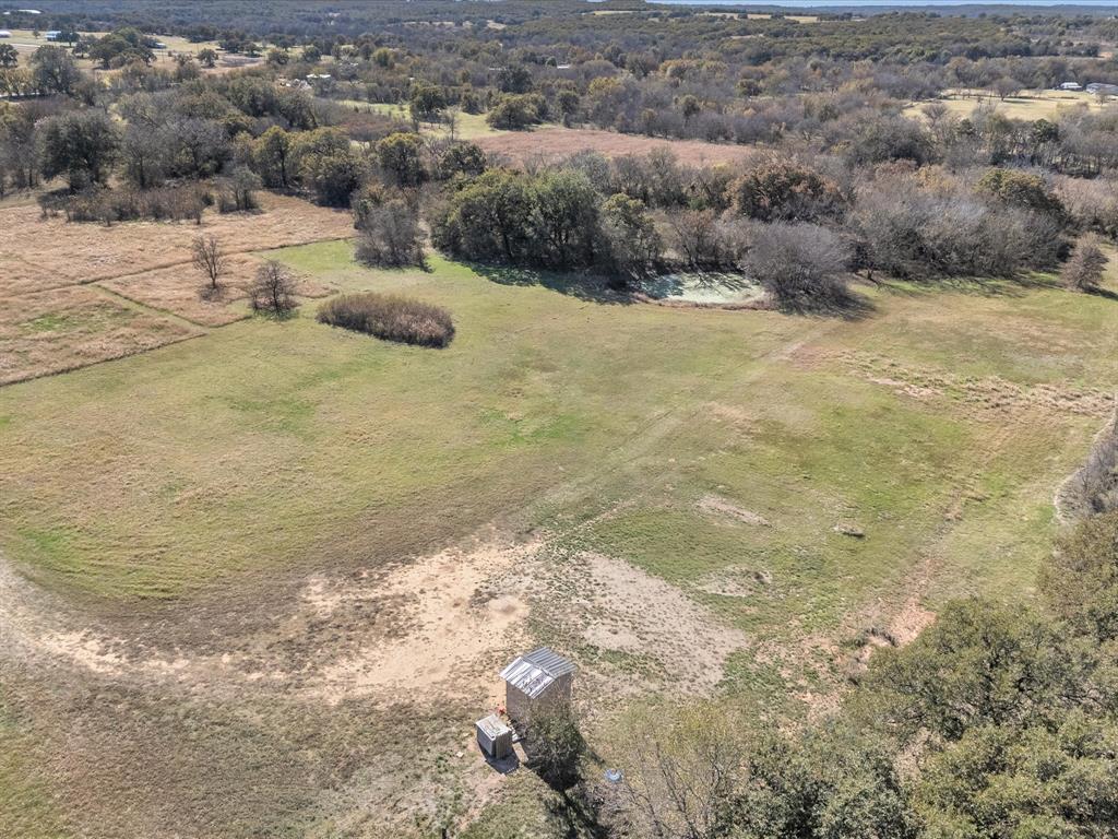 6334 Barrel Springs Road Nocona, TX 76255 - Photo 30 of 34 a view of a yard with a snow