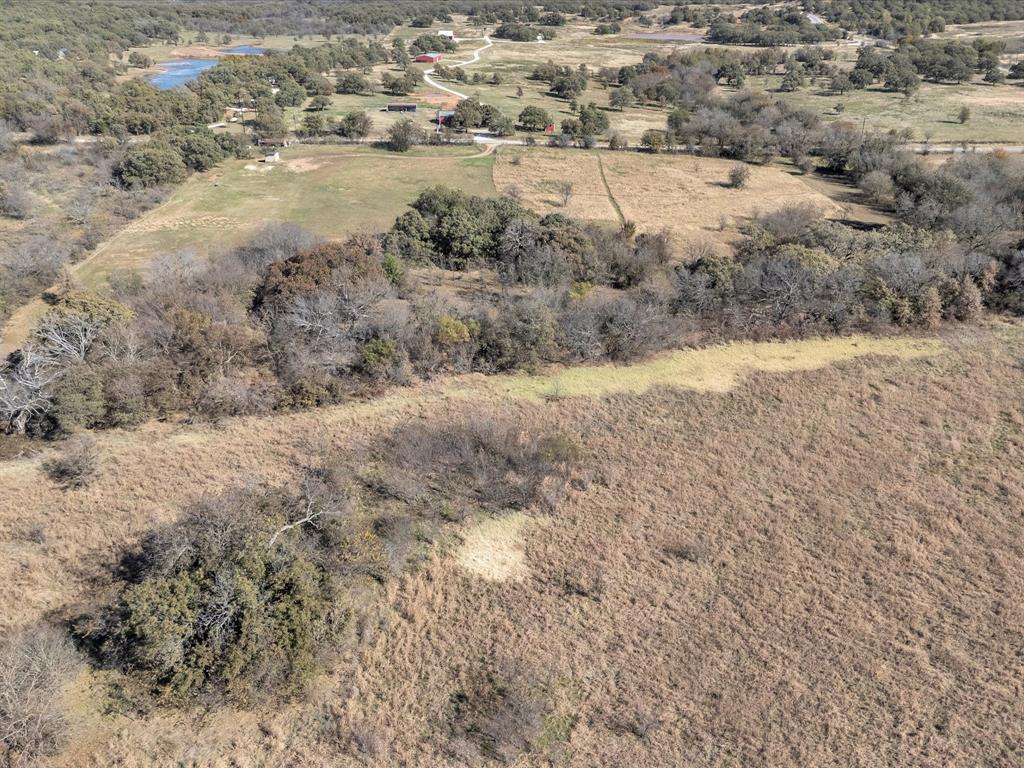 6334 Barrel Springs Road Nocona, TX 76255 - Photo 33 of 34 a view of a lake with mountain