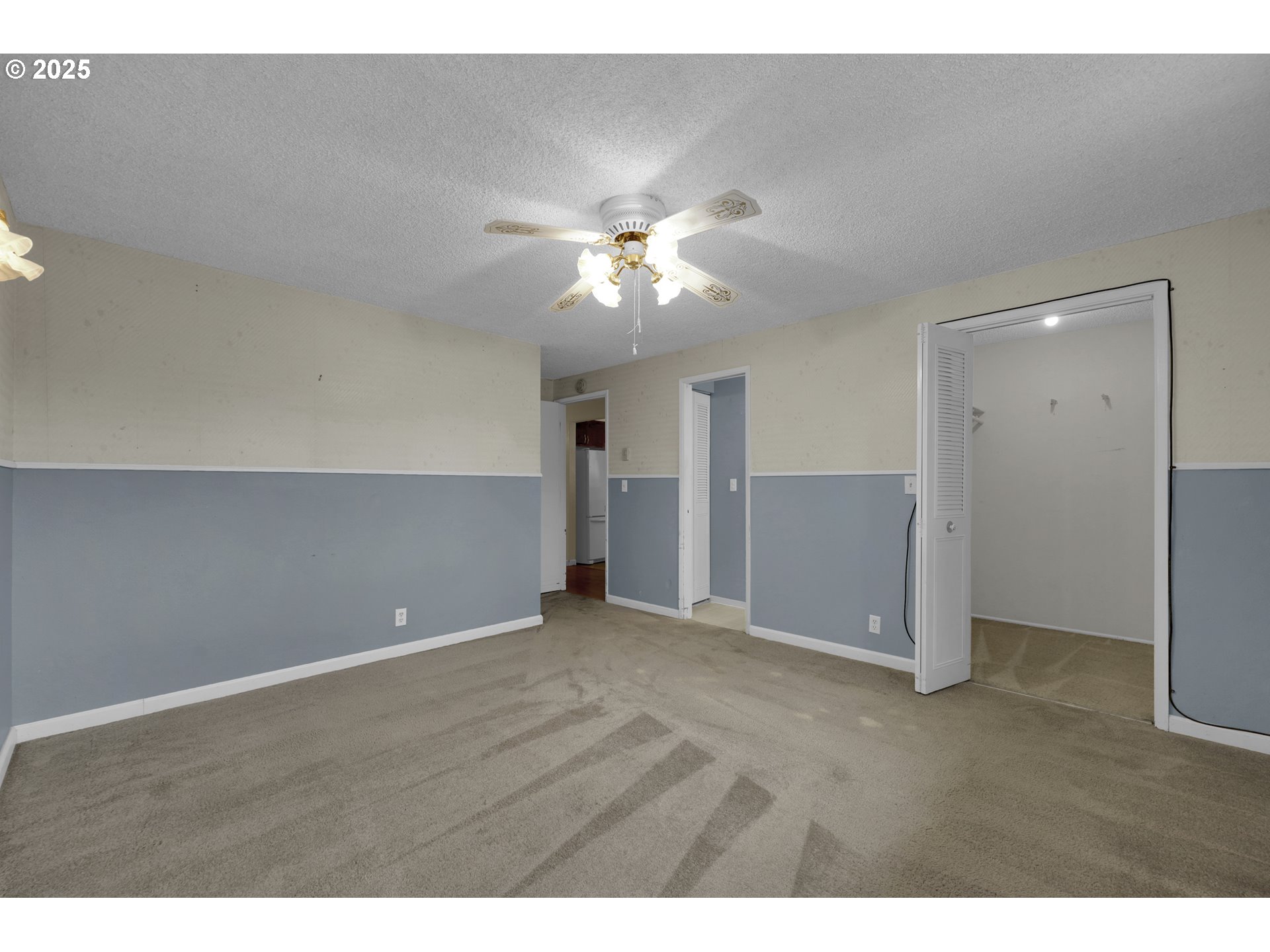 2315 19th Street Springfield, OR 97477 - Photo 20 of 30 a view of an empty room with a ceiling fan