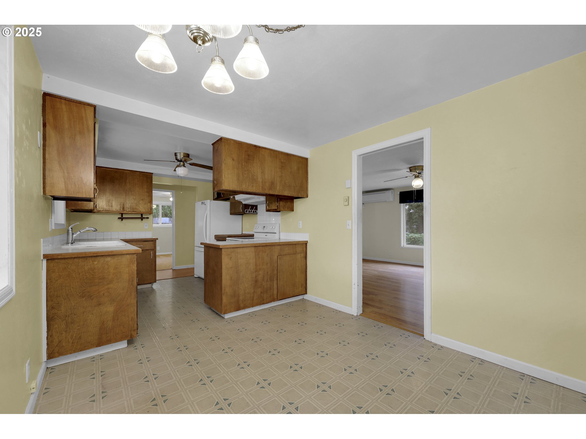 2315 19th Street Springfield, OR 97477 - Photo 8 of 30 a kitchen with a refrigerator cabinets and a sink